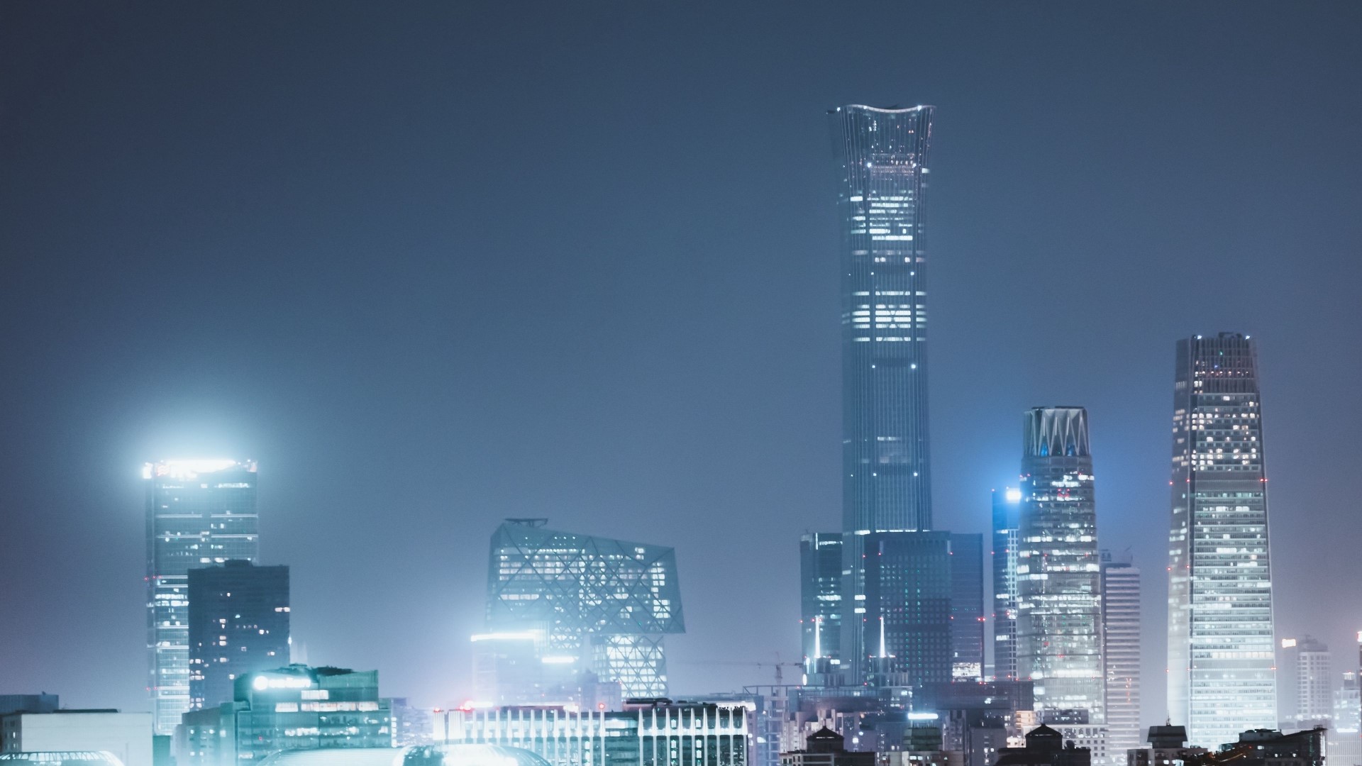Night cityscape with illuminated skyscrapers HD Wallpaper
