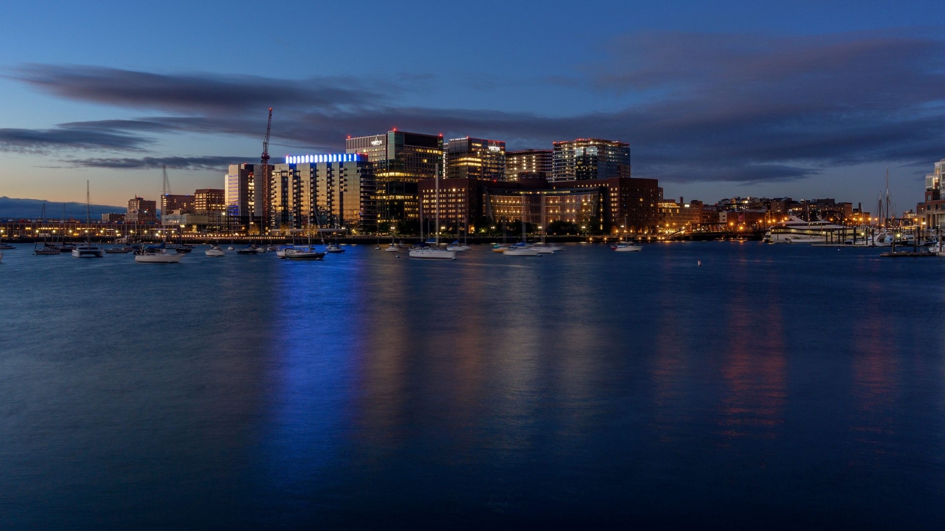 Night cityscape with harbor and boats HD Wallpaper