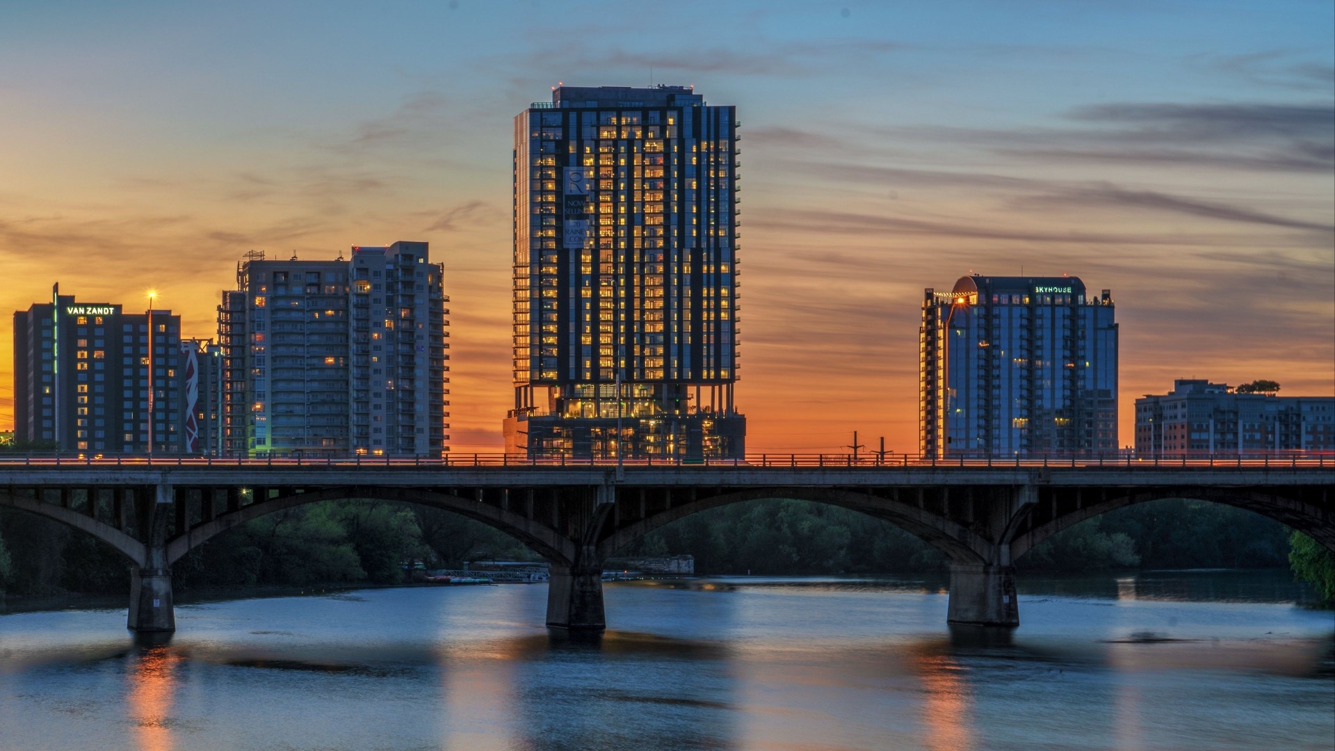 Cityscape with Bridge and Buildings at Sunset HD Wallpaper