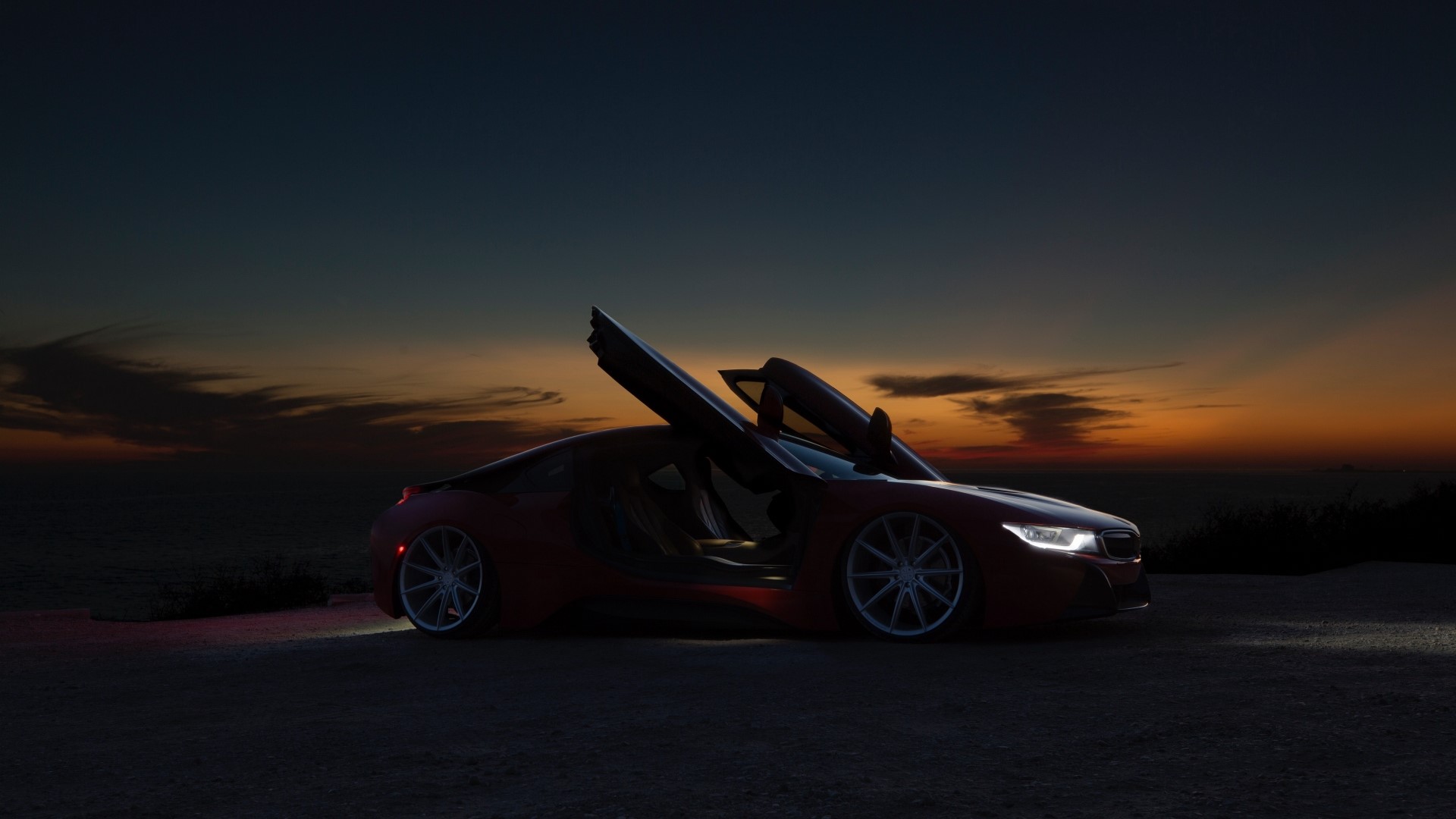 Red BMW i8 with doors open at sunset HD Wallpaper