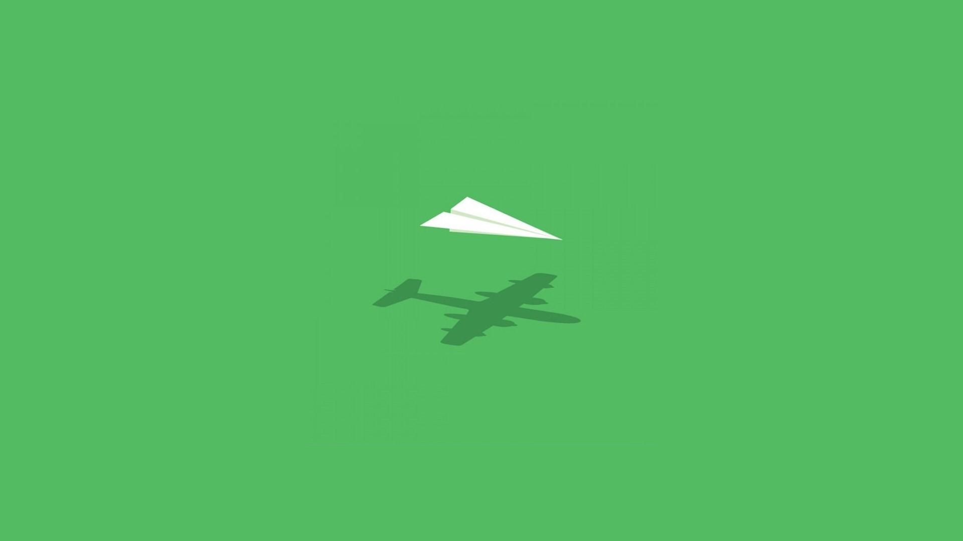 Paper airplane casting shadow of a bomber plane HD Wallpaper