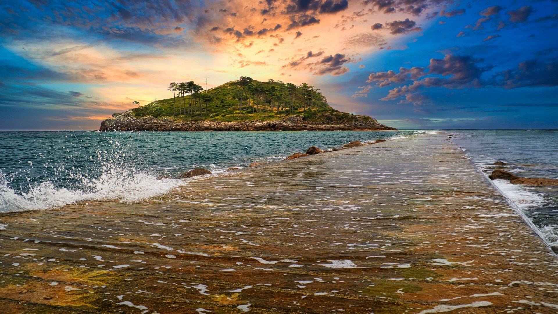 Island with a path leading to it at sunset HD Wallpaper
