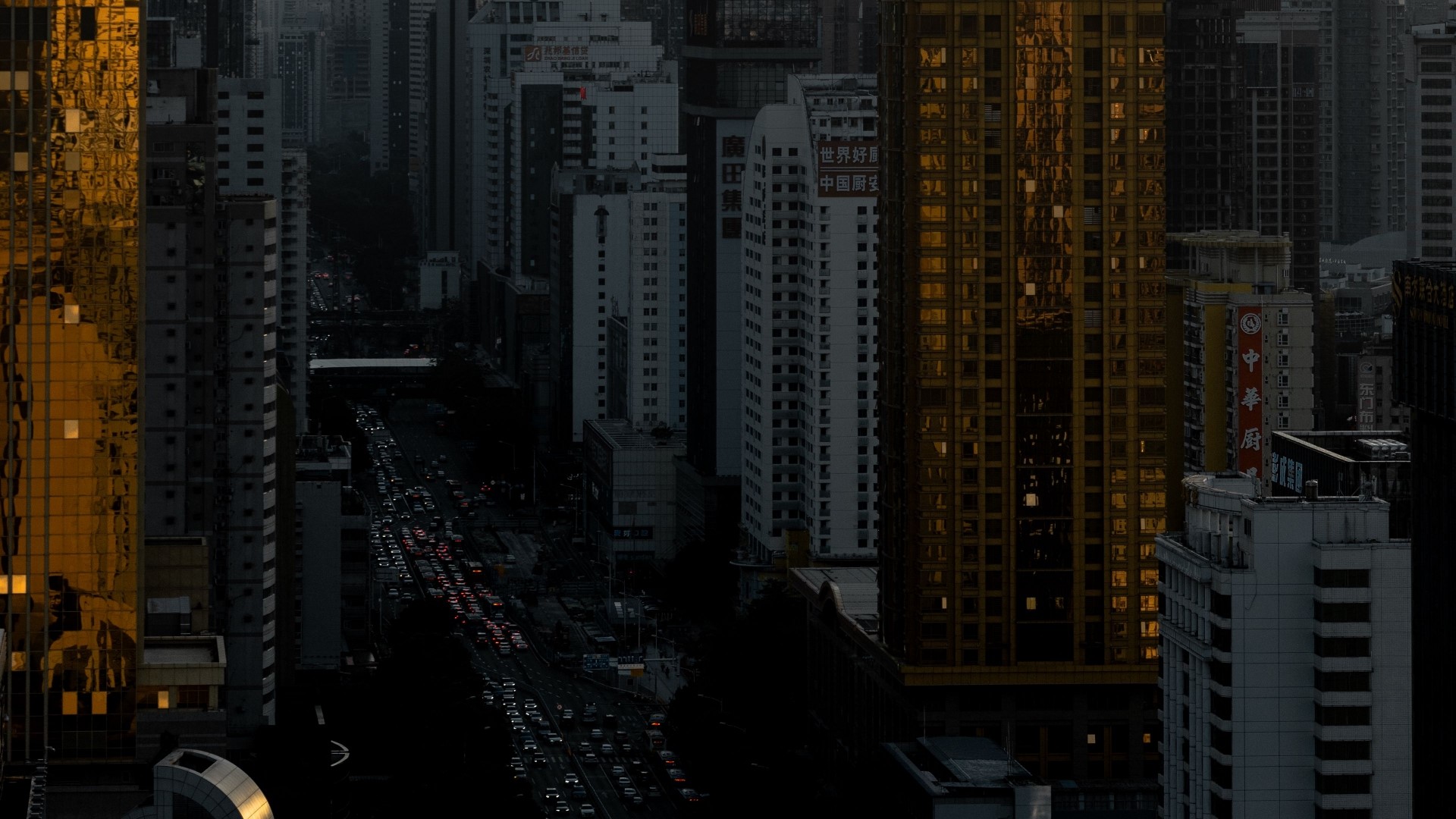 Skyscrapers in a city at dusk HD Wallpaper