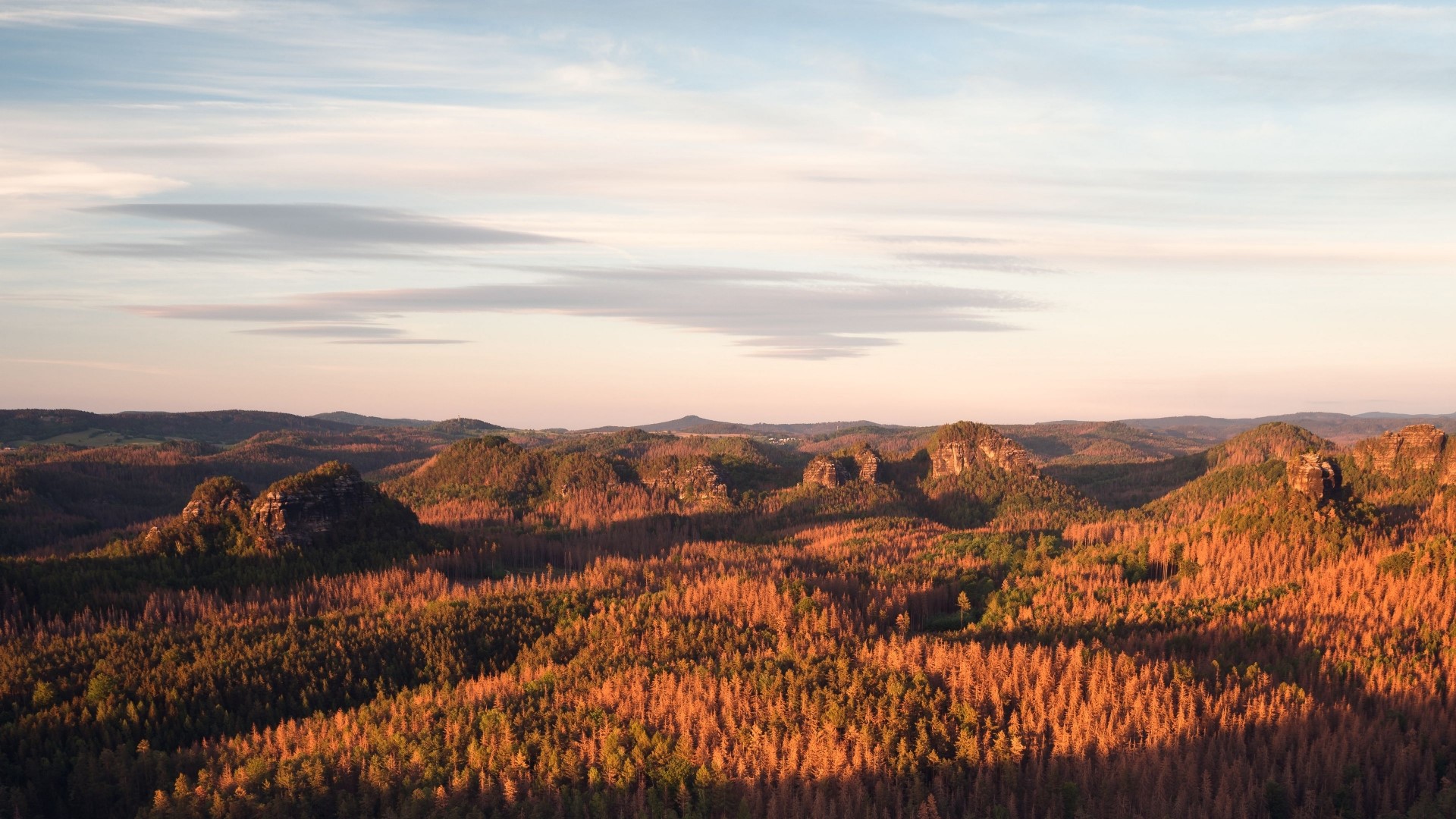 Forest landscape with rocky hills at sunset HD Wallpaper
