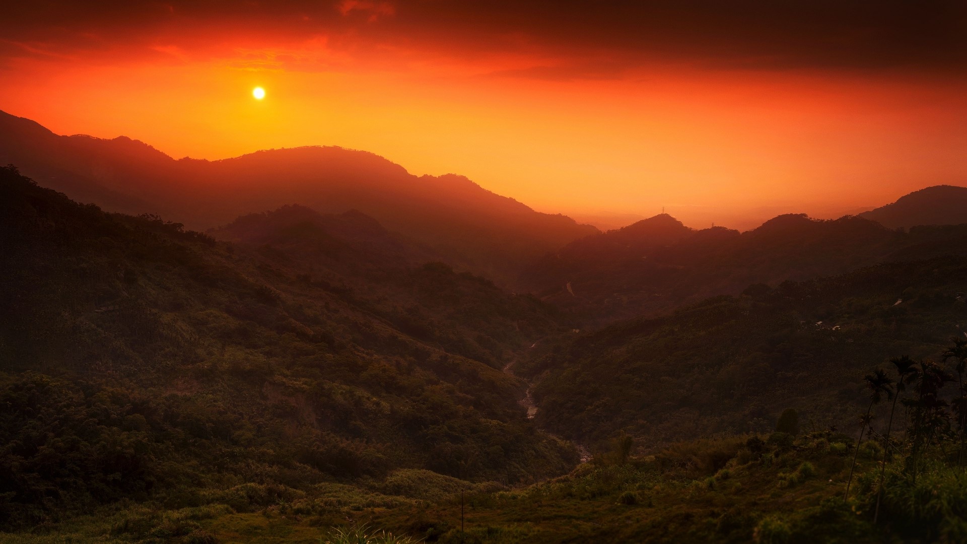 Sunset over misty mountains HD Wallpaper