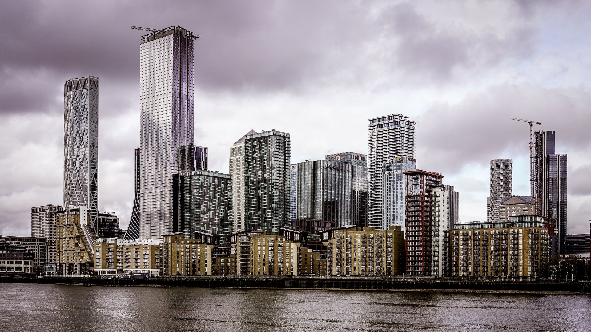 Cityscape with modern skyscrapers and river HD Wallpaper