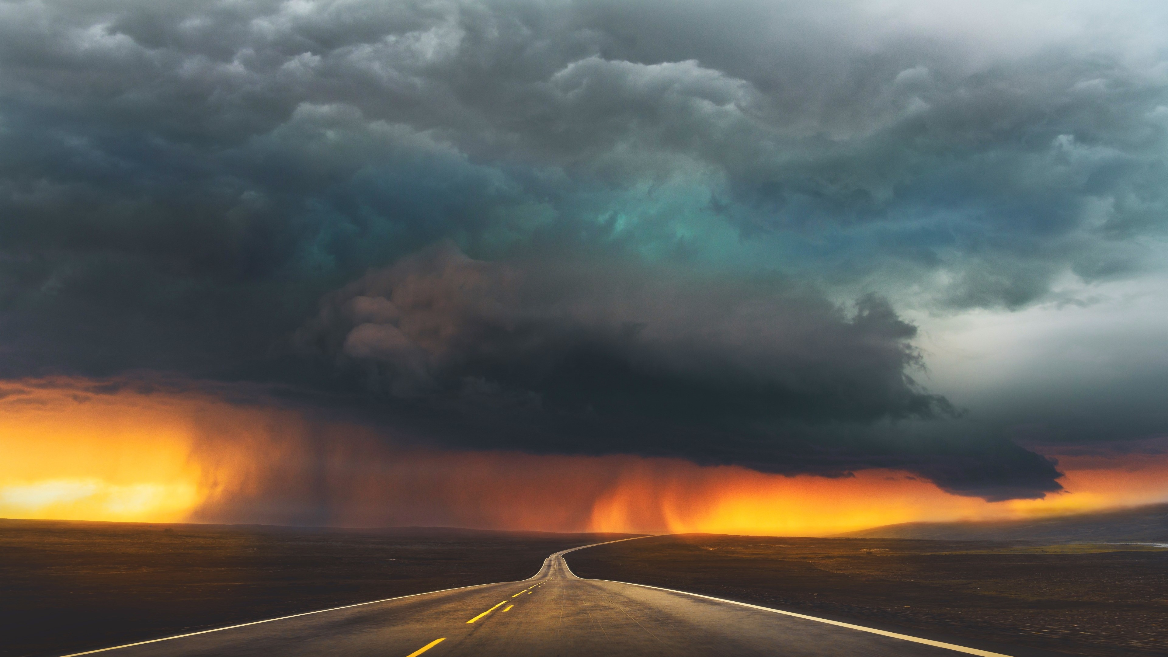 4K Road Under Stormy Sky HD Wallpaper