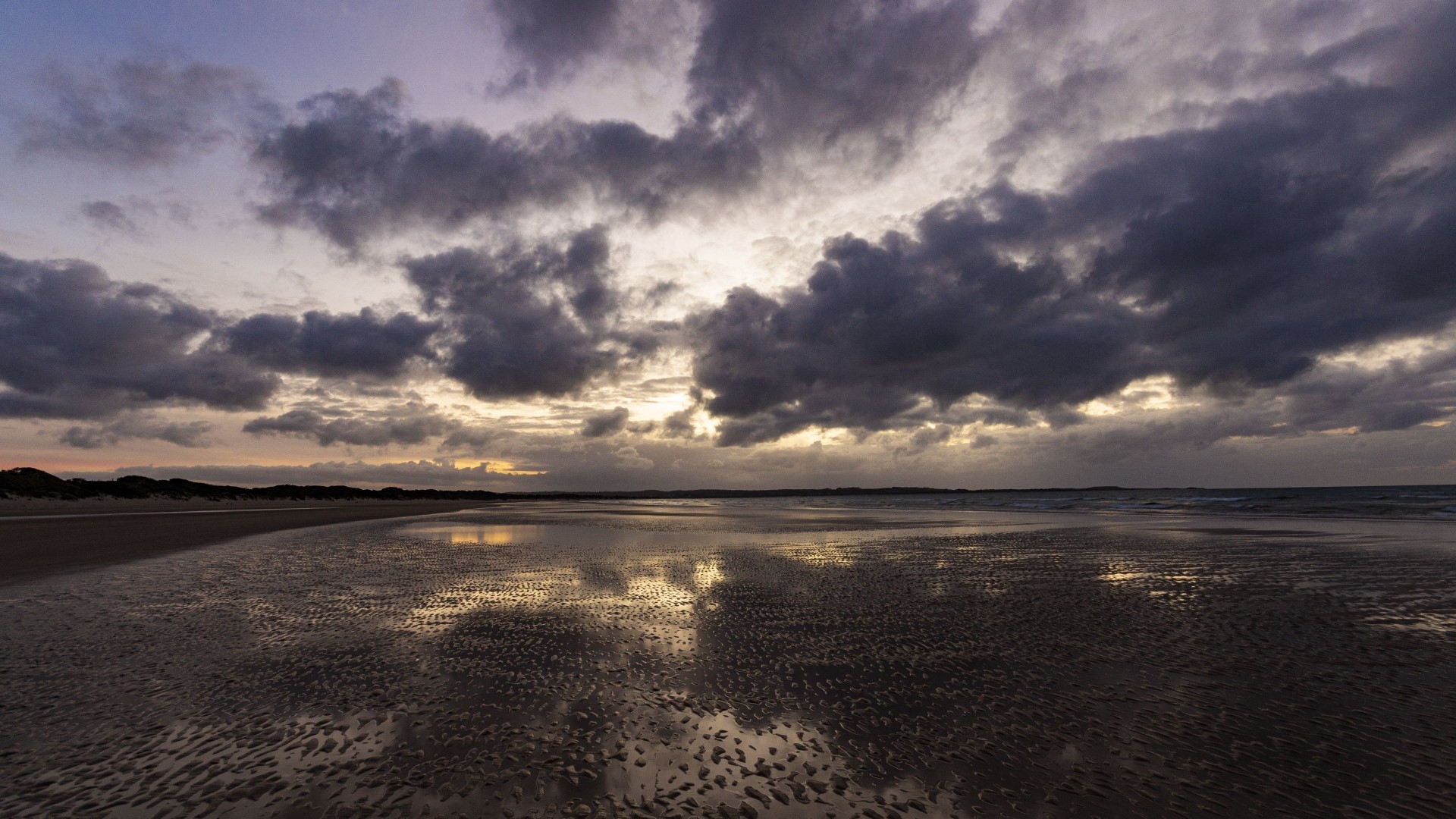 Beach at Dusk with Dramatic Clouds HD Wallpaper