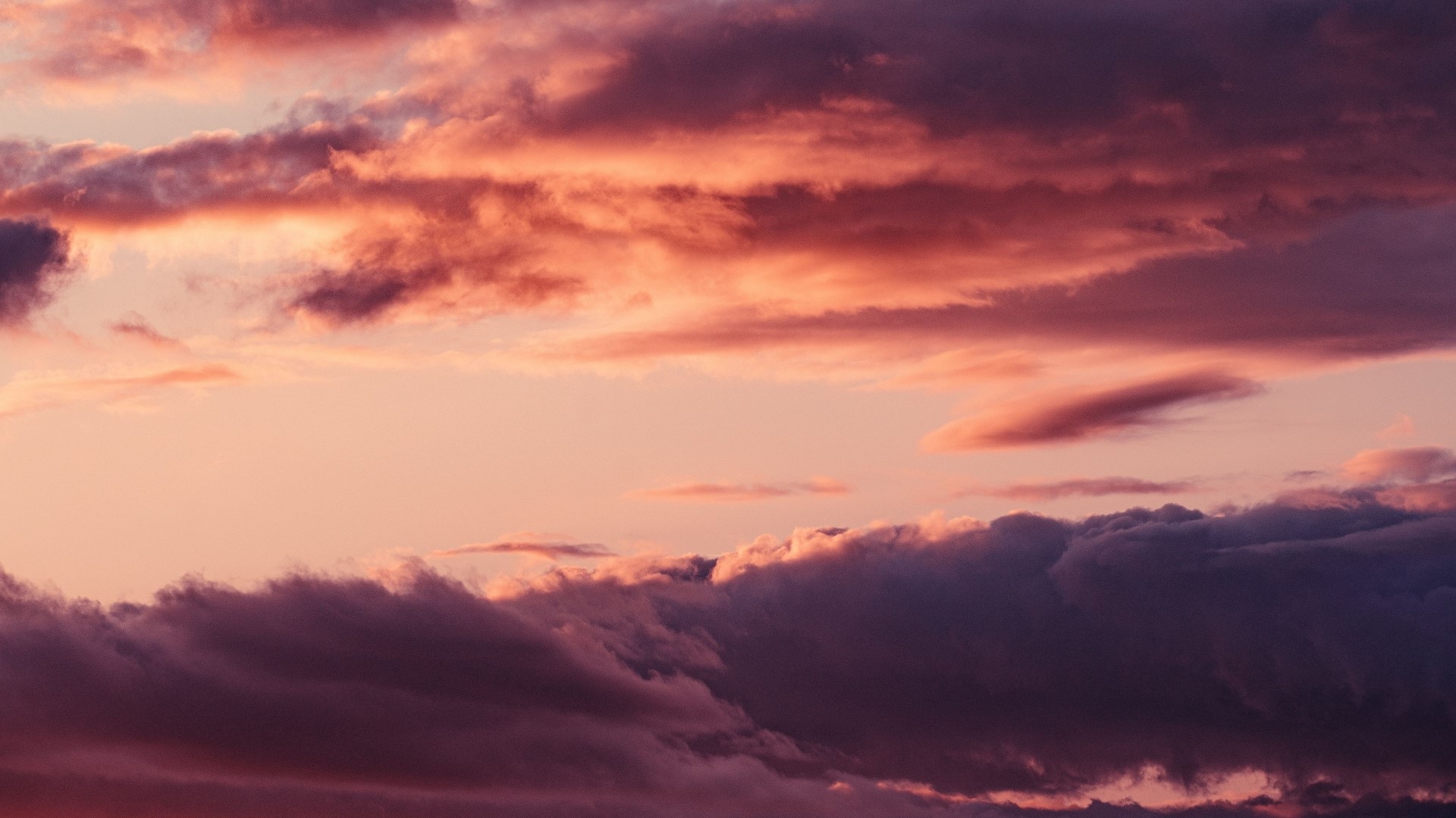 Sunset clouds with pink and purple hues HD Wallpaper