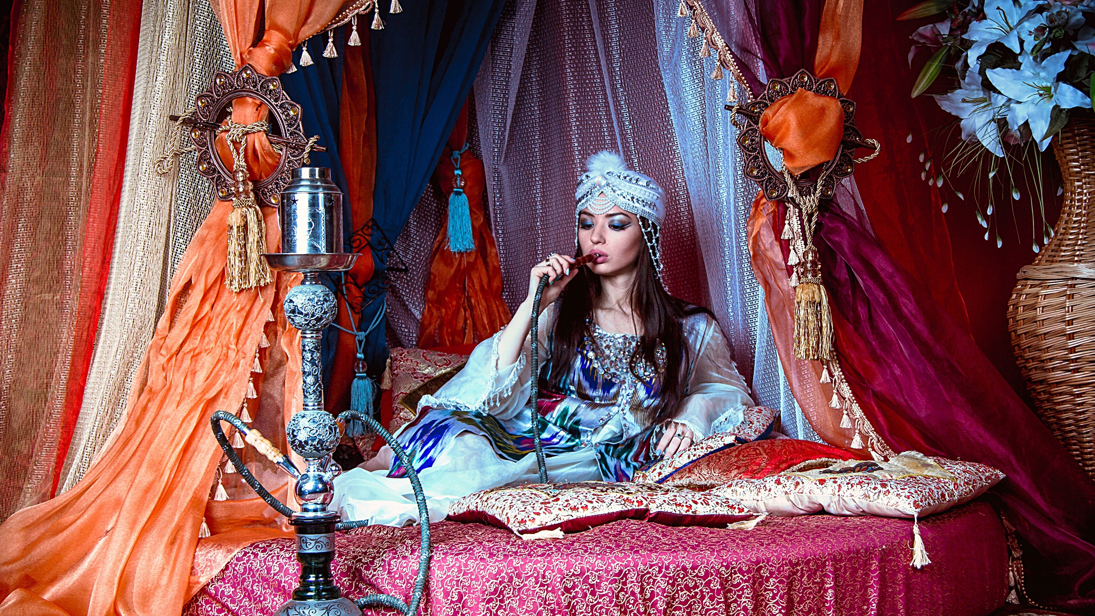 Girl smoking hookah in a tent HD Wallpaper