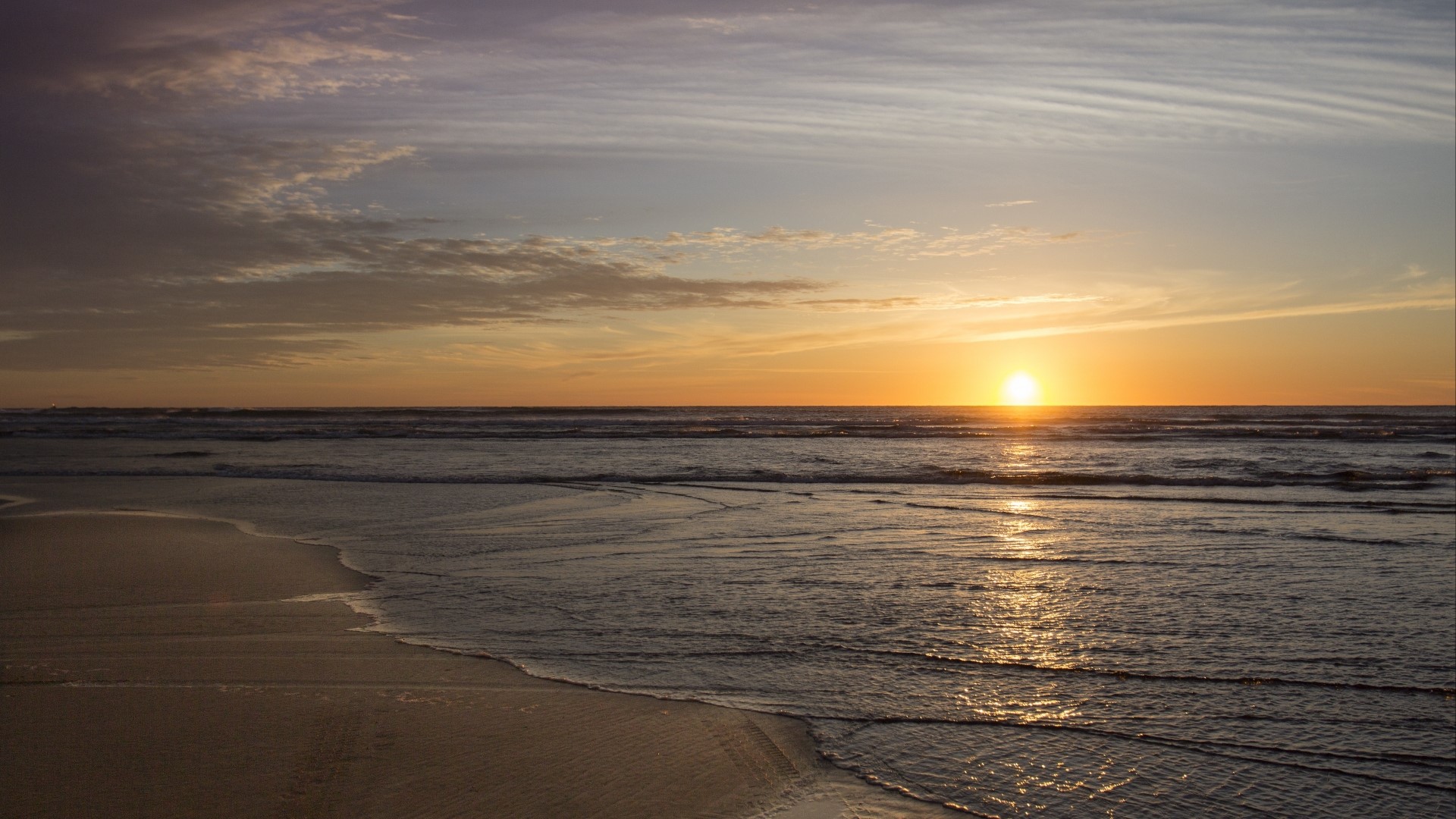 Sunset over the ocean with beach HD Wallpaper