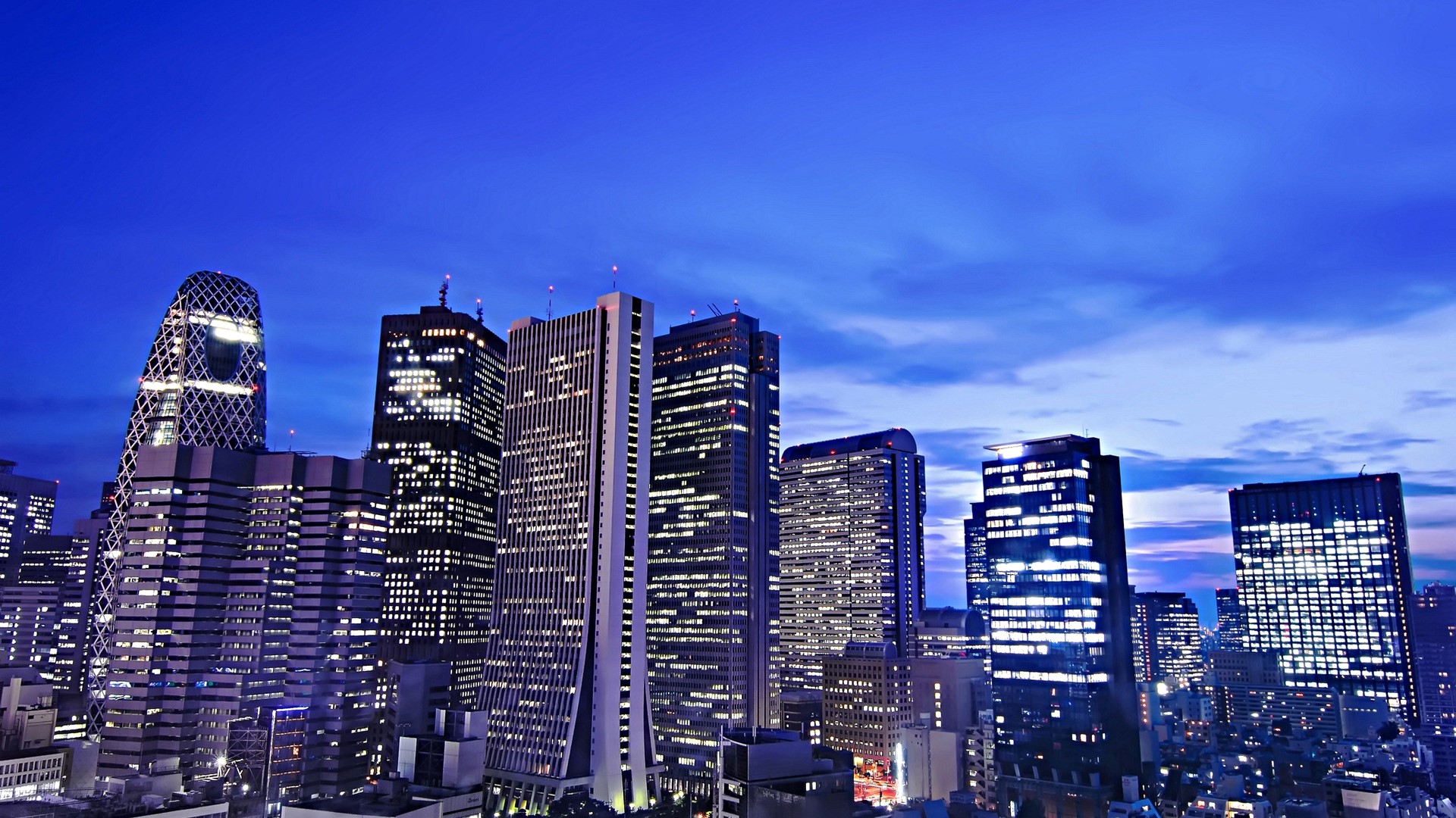 Night cityscape with illuminated skyscrapers HD Wallpaper