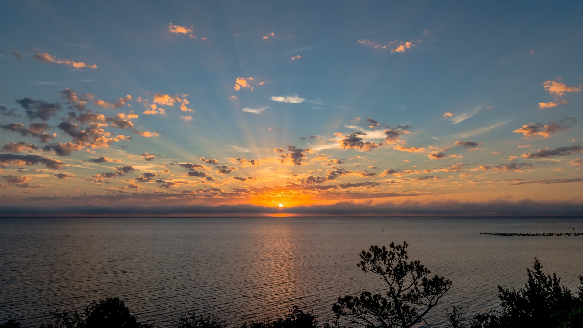 Sunset over the ocean with clouds HD Wallpaper
