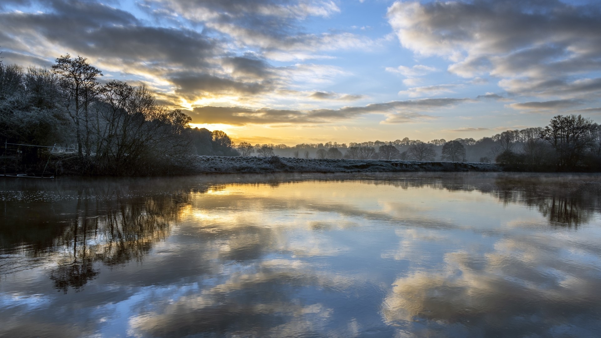 Sunrise over a misty river with trees HD Wallpaper