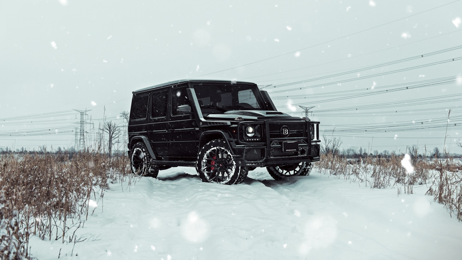 Black Mercedes G-Wagon in Snowy Field HD Wallpaper