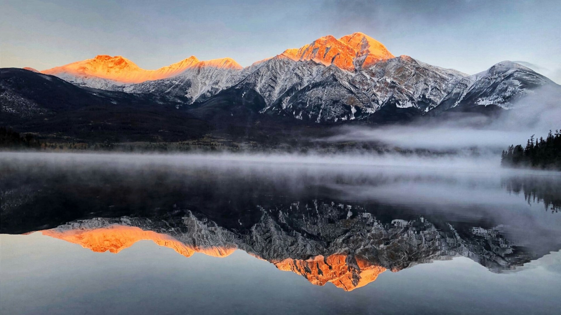 Mountain landscape with lake reflection at sunrise HD Wallpaper