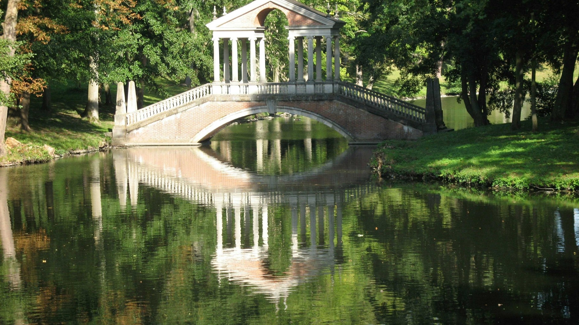 Bridge with classical temple and reflection in water HD Wallpaper