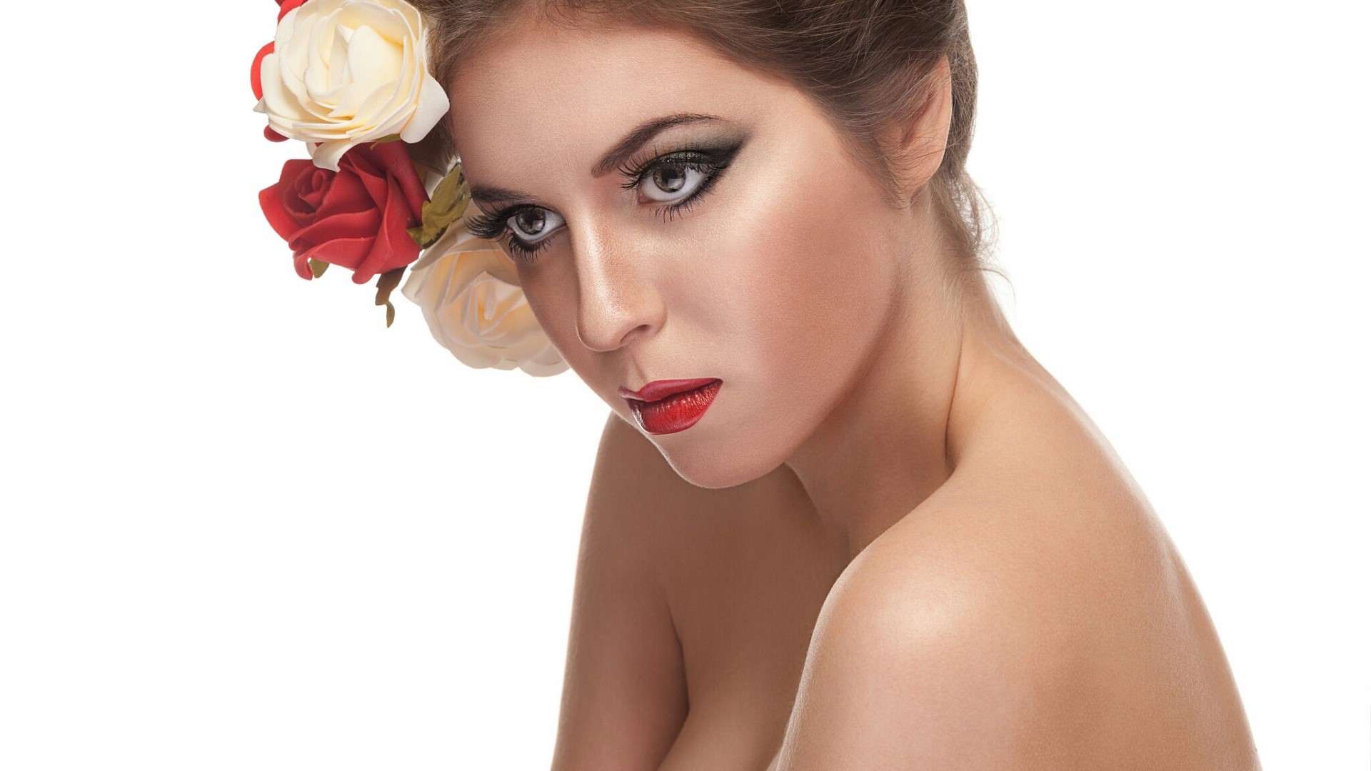 Woman with flowers in her hair and red lipstick HD Wallpaper