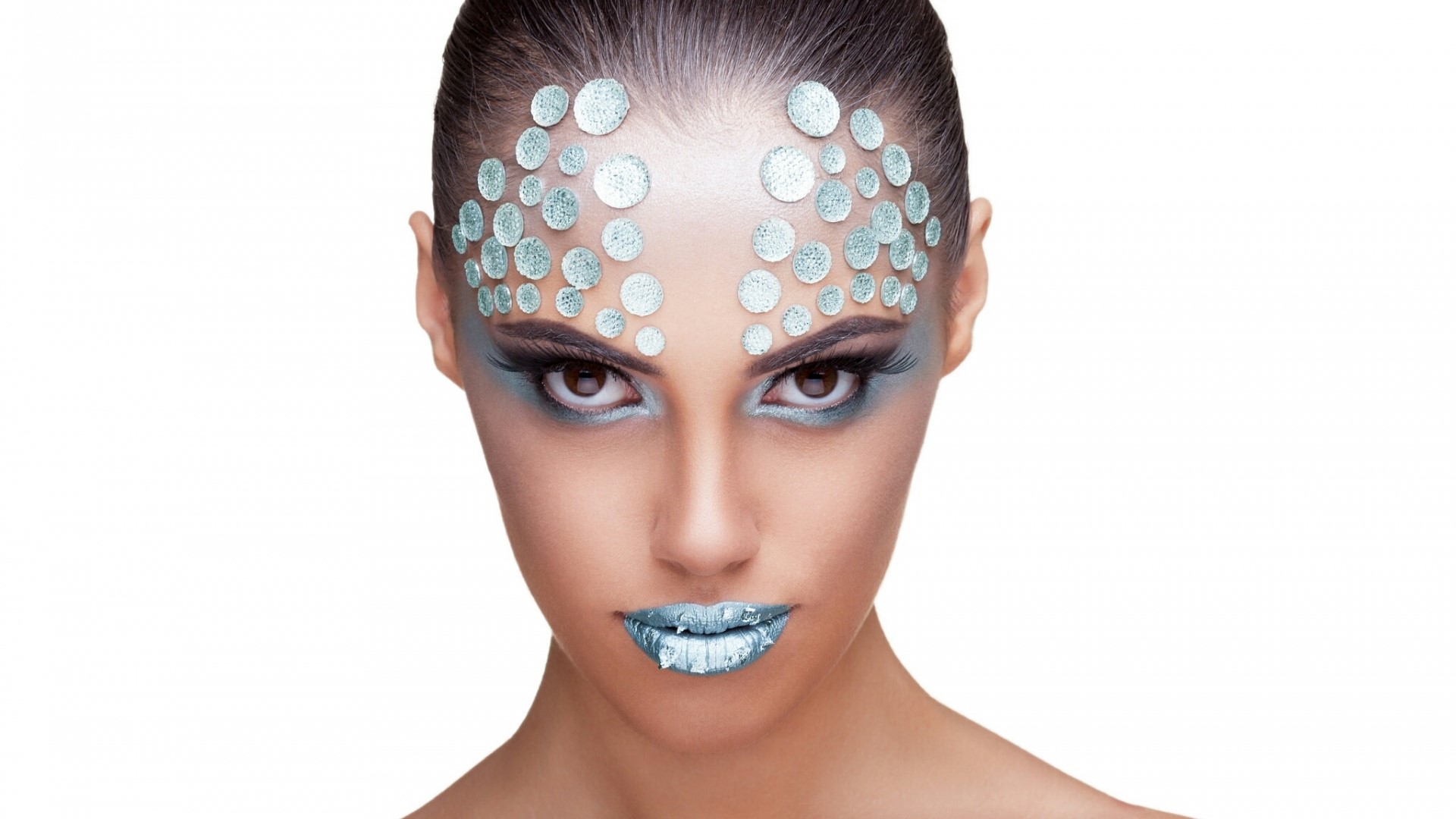 Woman with blue makeup and face gems HD Wallpaper