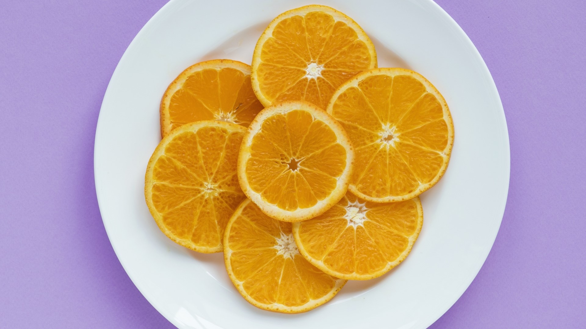Orange Slices on a White Plate HD Wallpaper