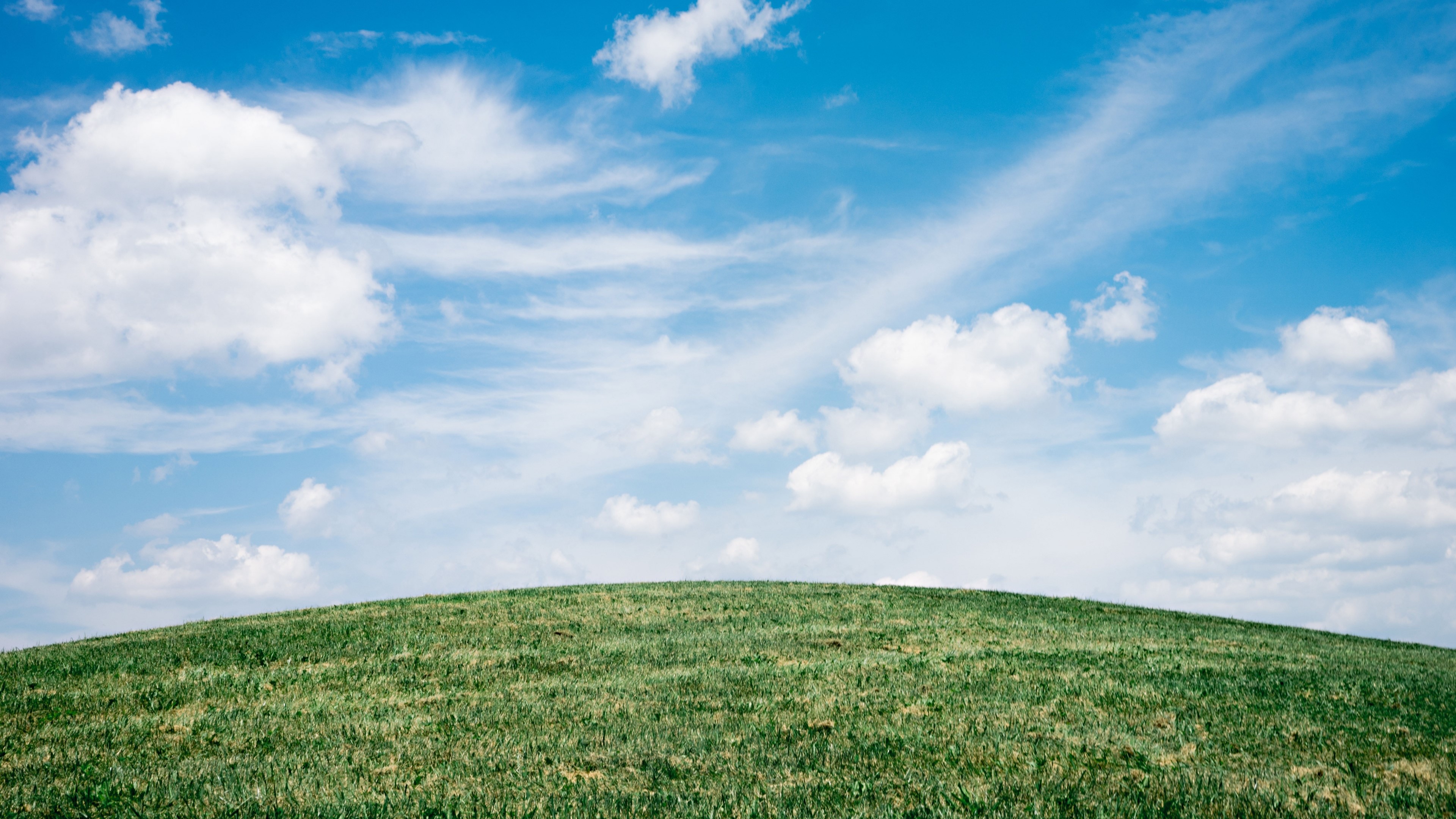 Green Hill Under Blue Sky with Clouds HD Wallpaper