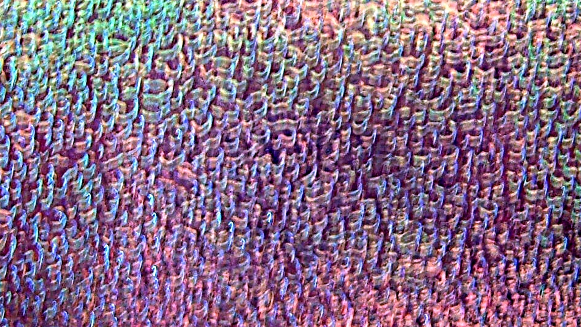 Abstract textured surface with iridescent colors HD Wallpaper
