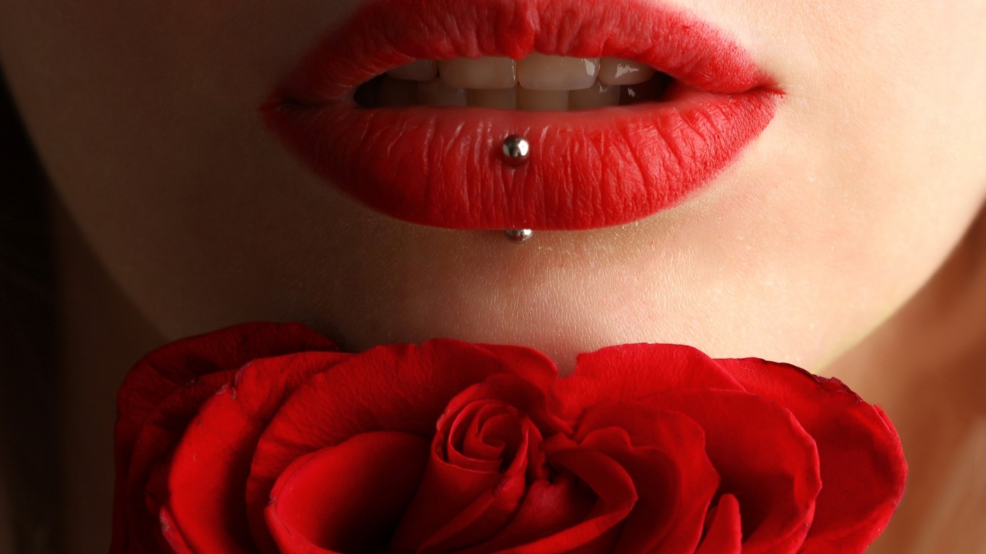 Close-up of red lips with piercing and rose HD Wallpaper