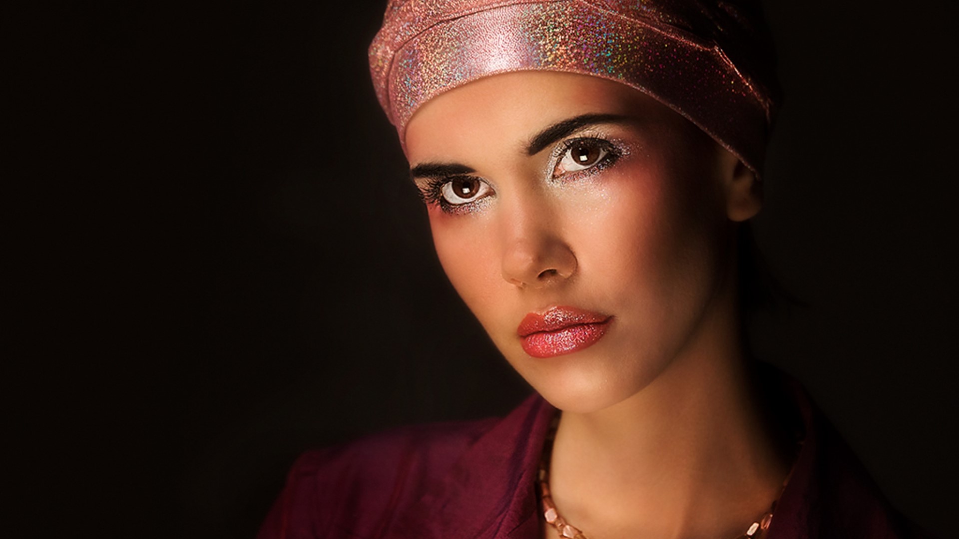 Woman with glittery headscarf and makeup HD Wallpaper