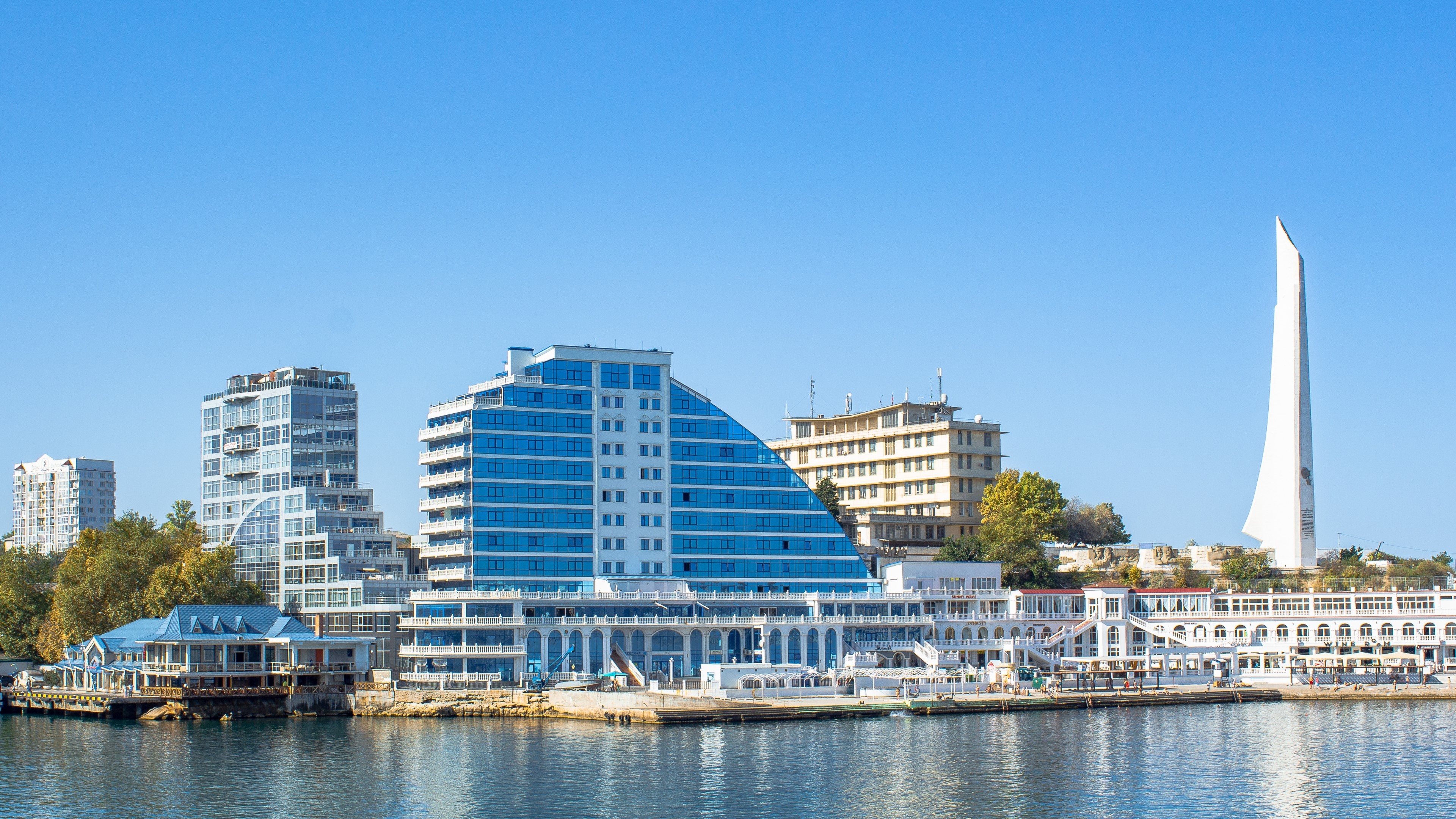 4K Sevastopol waterfront with modern buildings and monument HD Wallpaper