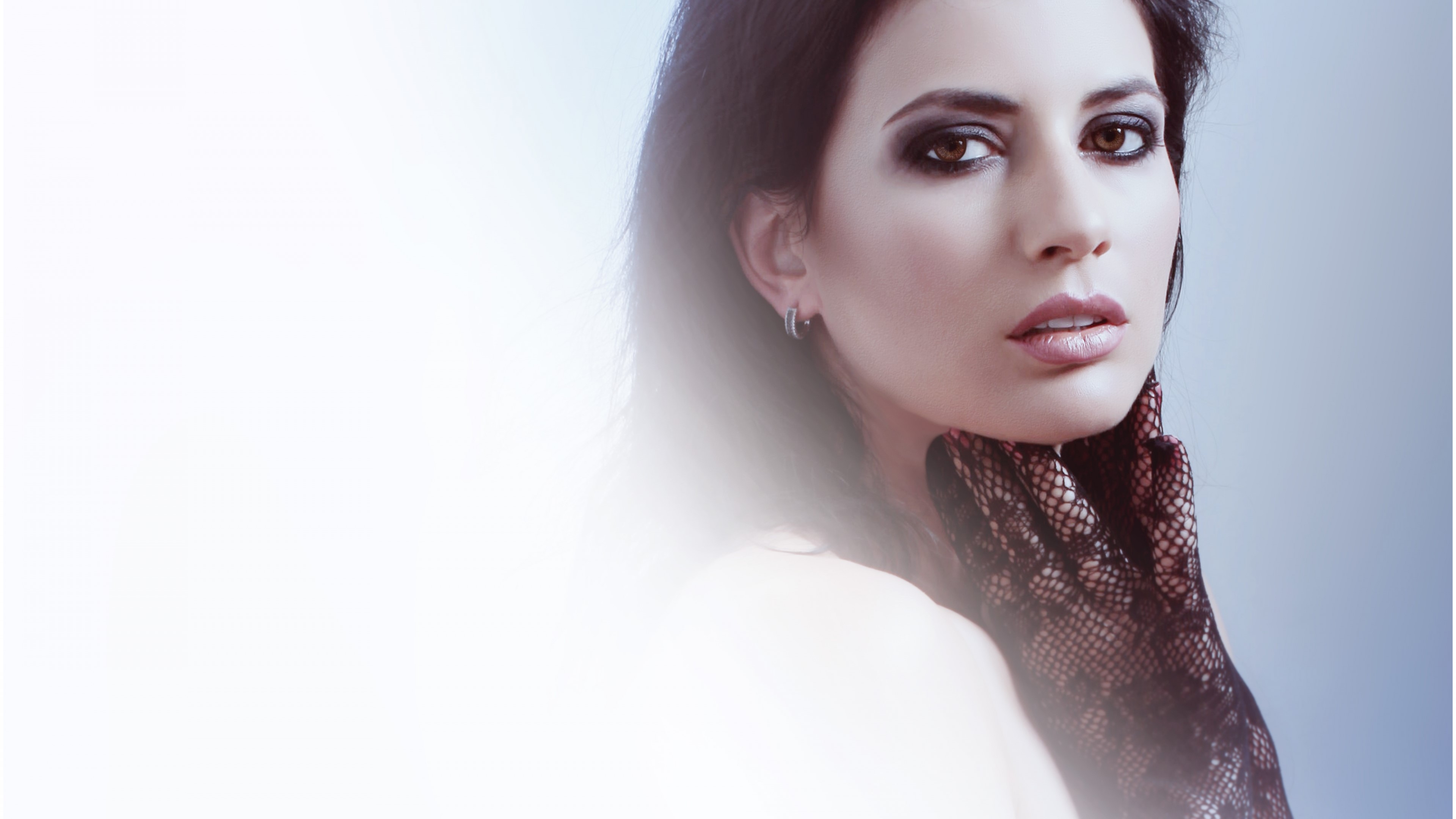 Woman with dark eye makeup and black gloves HD Wallpaper