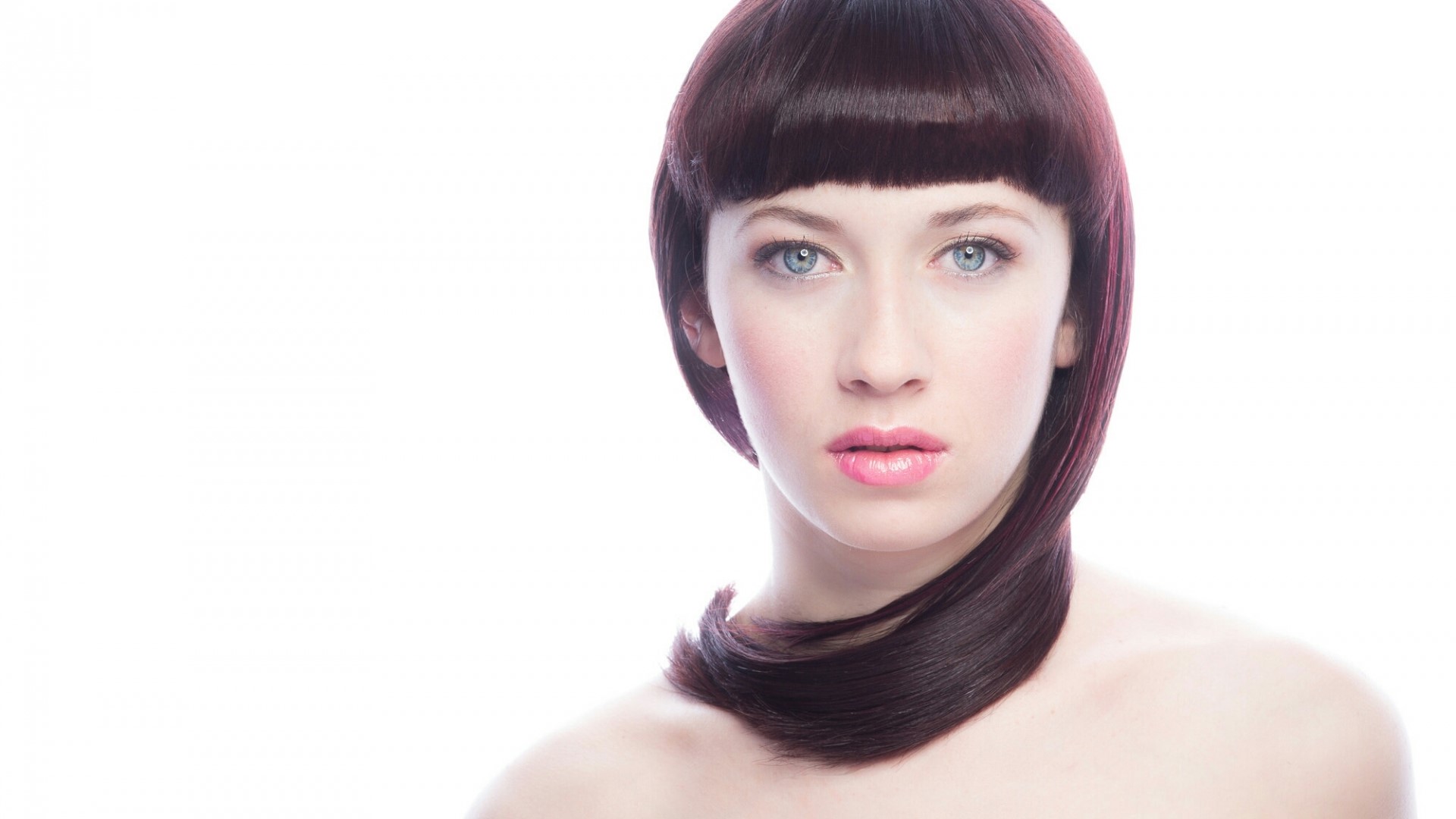 Woman with dark bob haircut and blue eyes HD Wallpaper