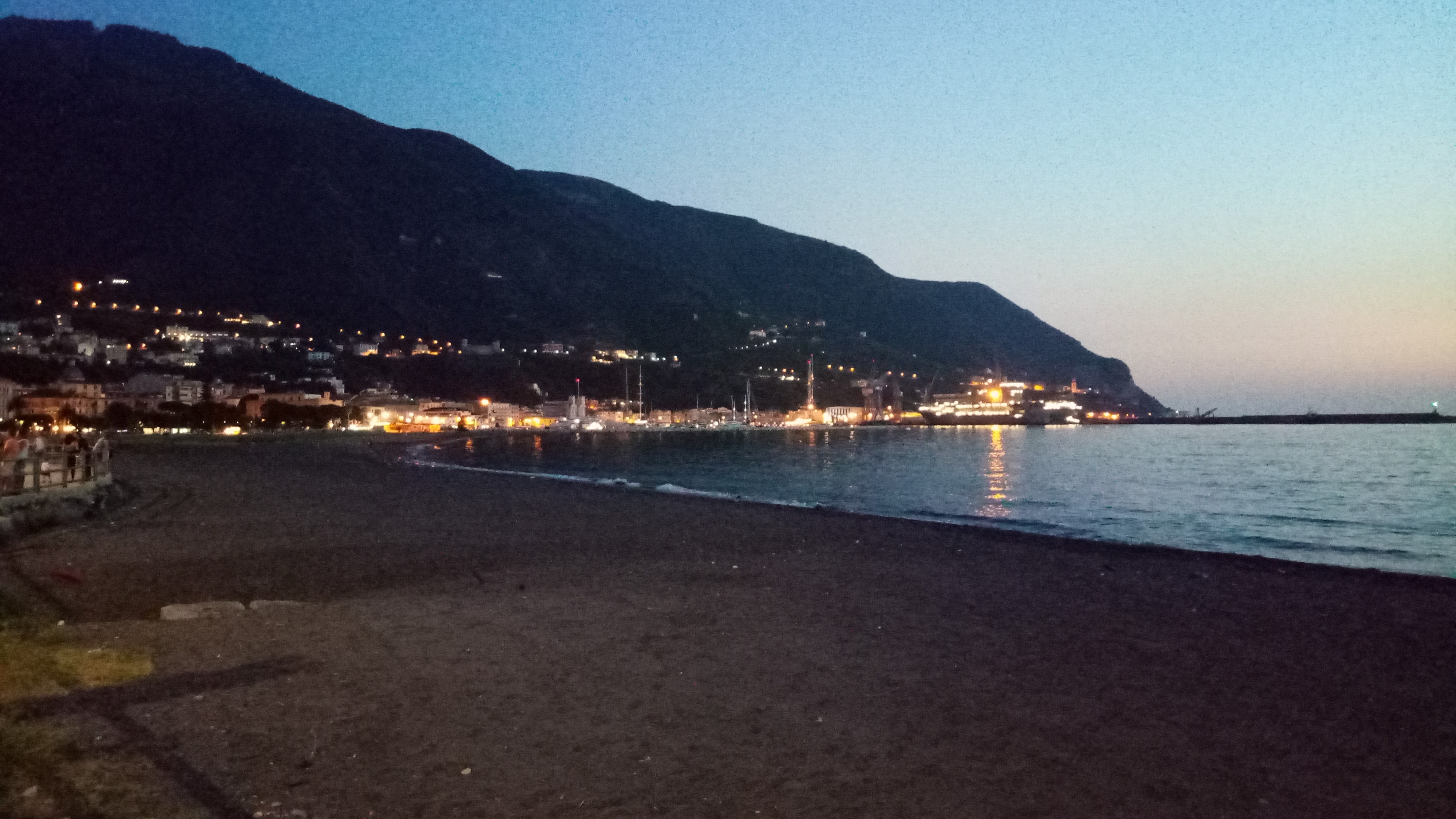 4K Italy Beach at Dusk with Town Lights HD Wallpaper