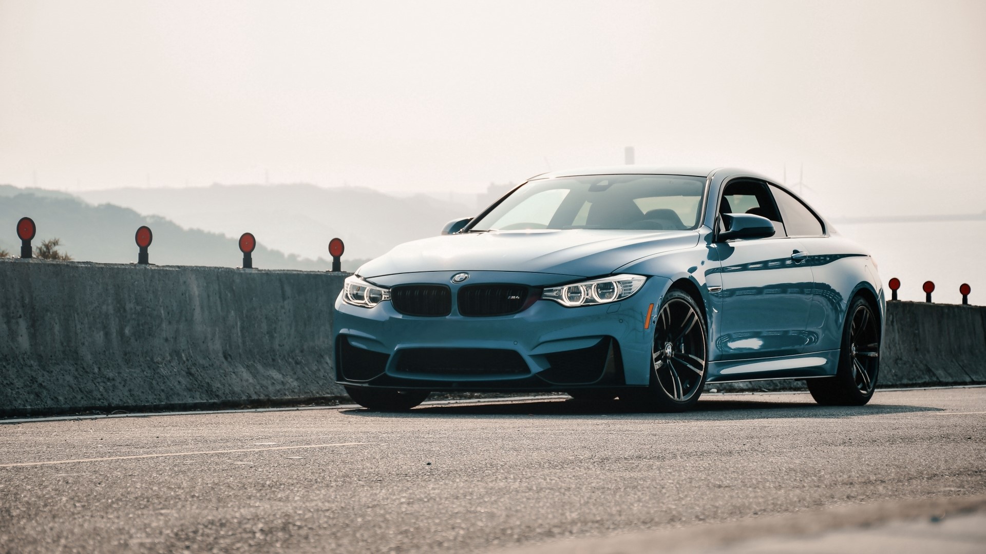 Blue BMW M4 Coupe on a Road HD Wallpaper