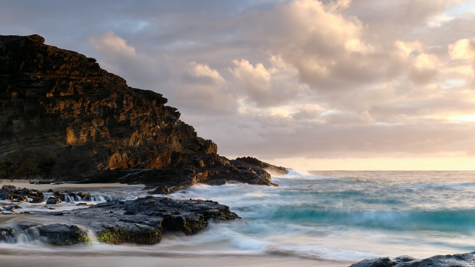 Rocky Shoreline with Waves at Sunset HD Wallpaper