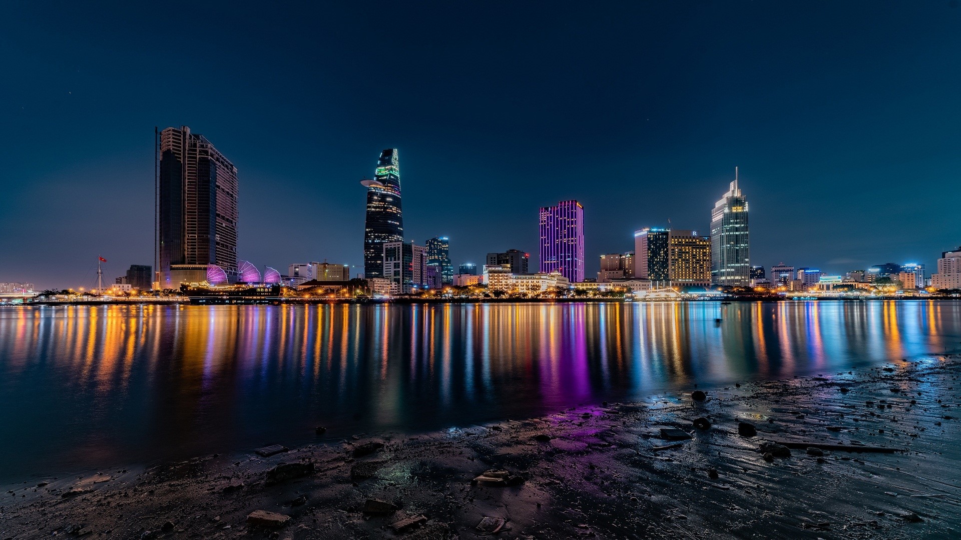 Night cityscape with river reflections HD Wallpaper