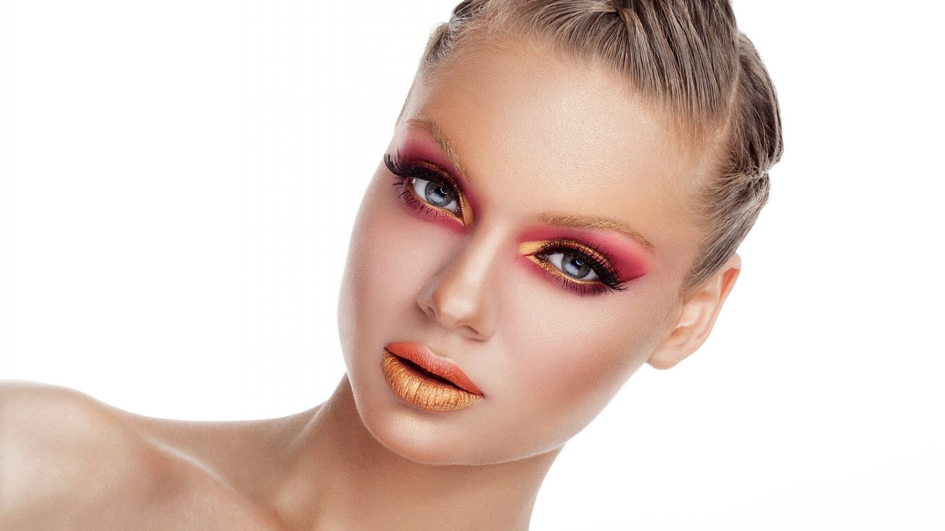 Woman with dramatic makeup and braided hair HD Wallpaper