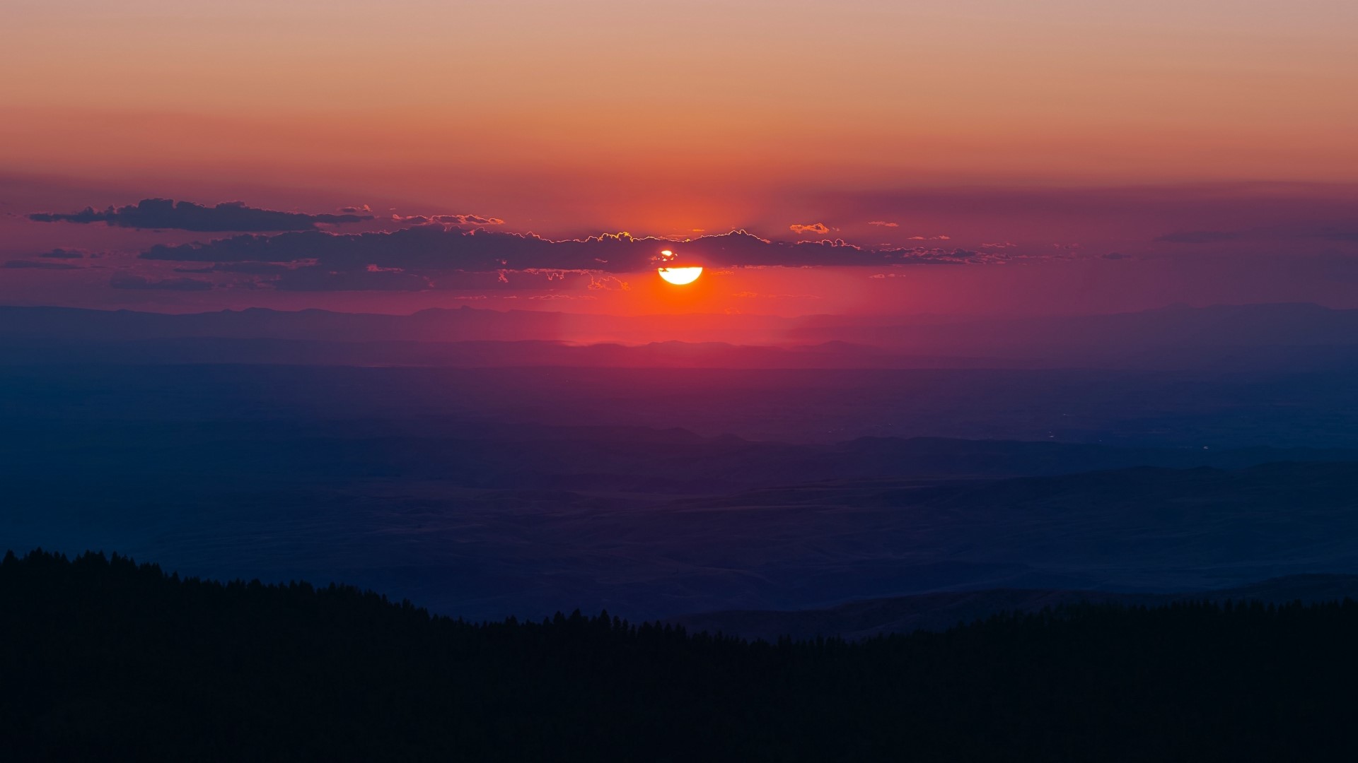 Sunset over rolling hills HD Wallpaper