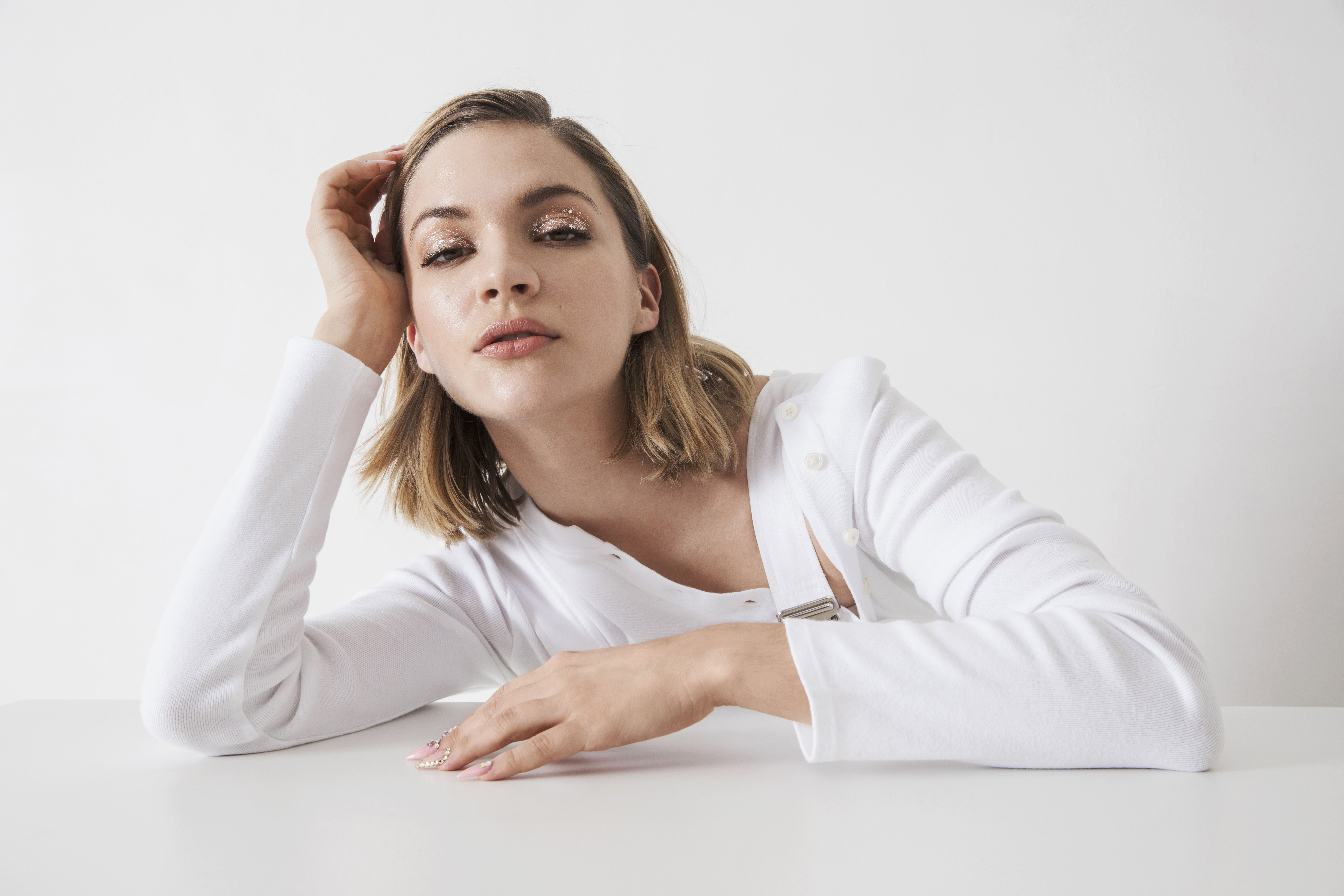 Tove Styrke posing with hand on head HD Wallpaper