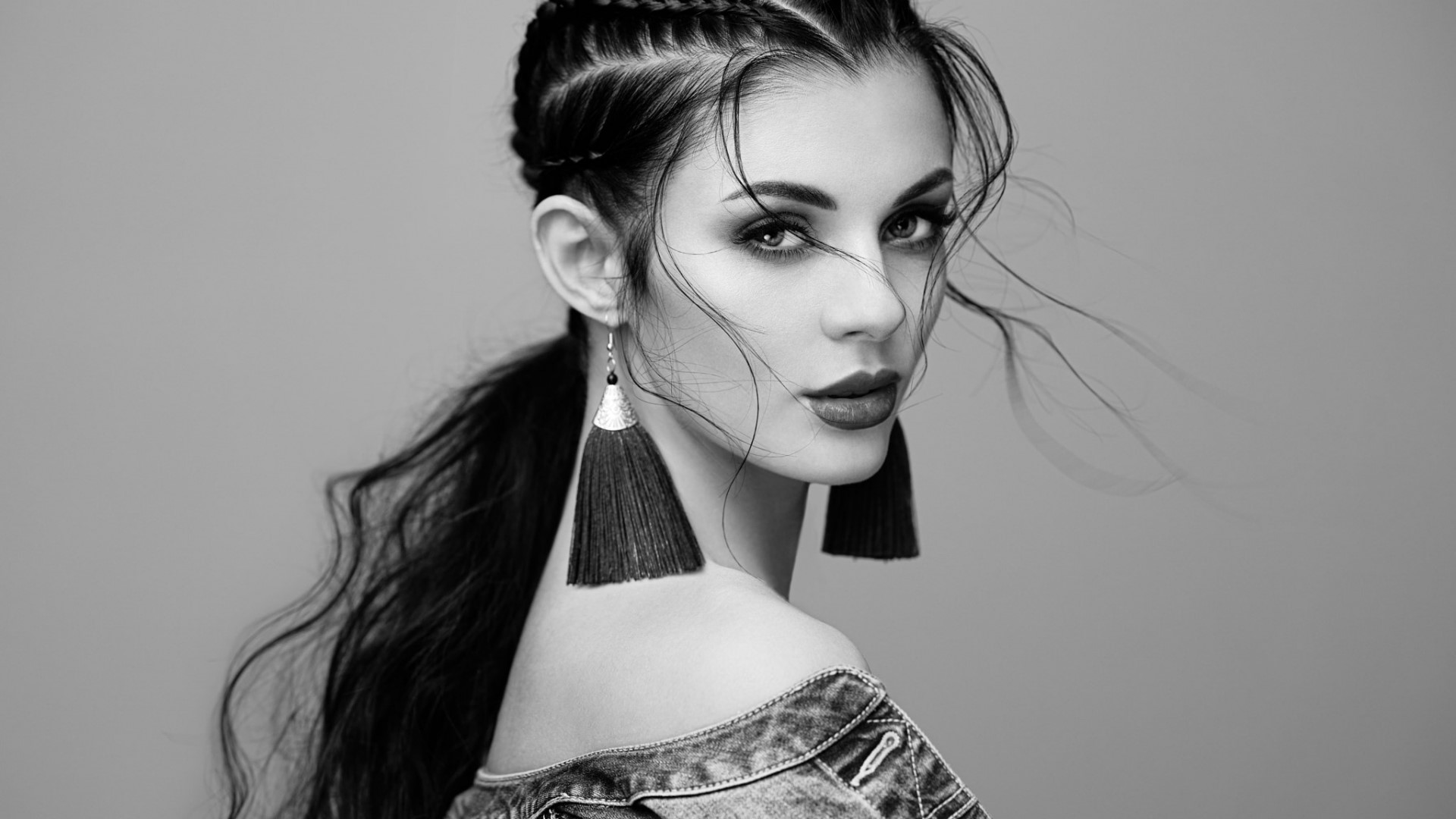 Woman with braids and large earrings HD Wallpaper