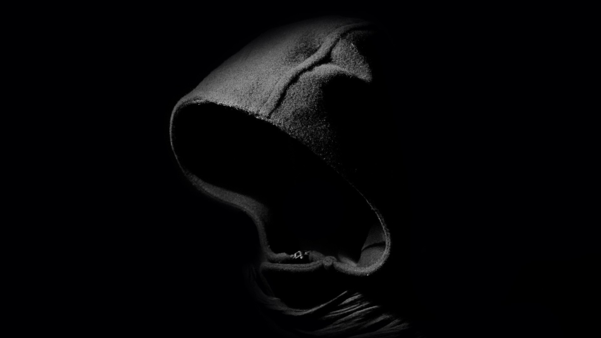 Hooded figure in darkness HD Wallpaper