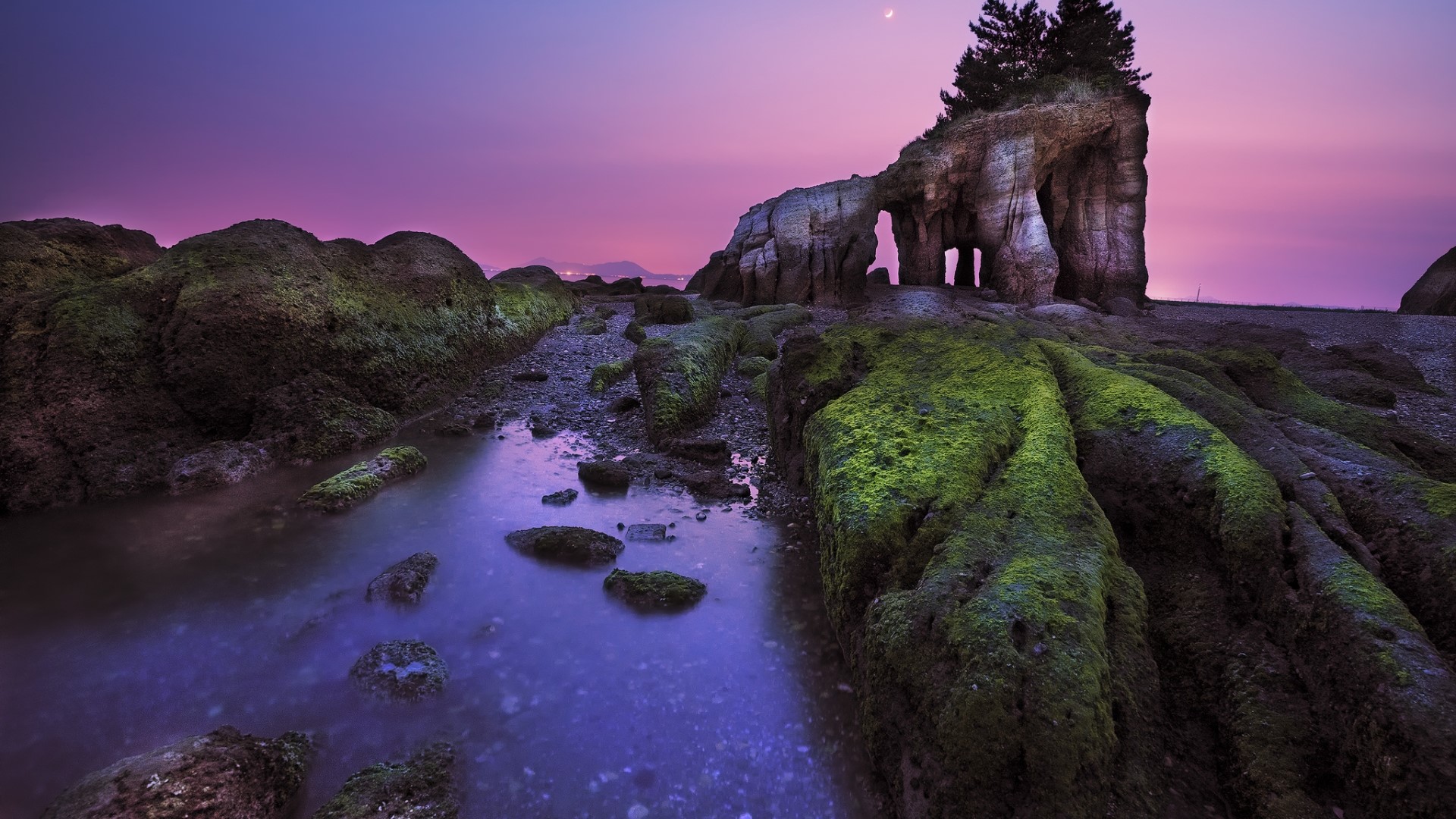 Rocky Shoreline with Arch Rock at Twilight HD Wallpaper