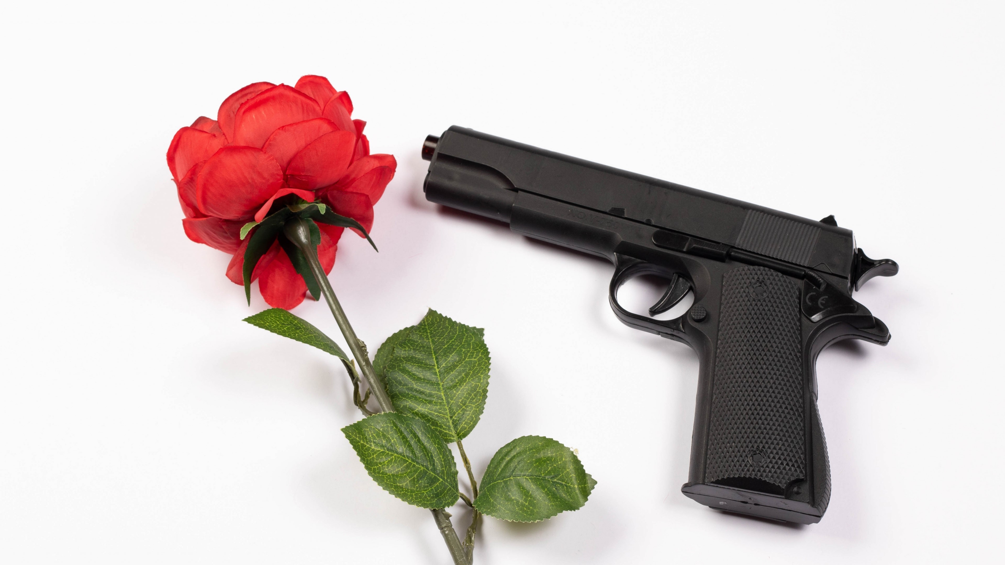 4K Pistol and Red Rose HD Wallpaper