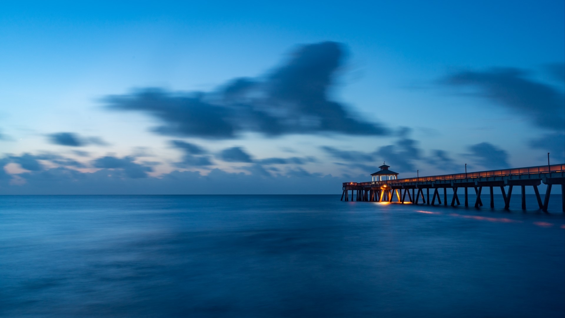 Pier over the ocean at dusk HD Wallpaper