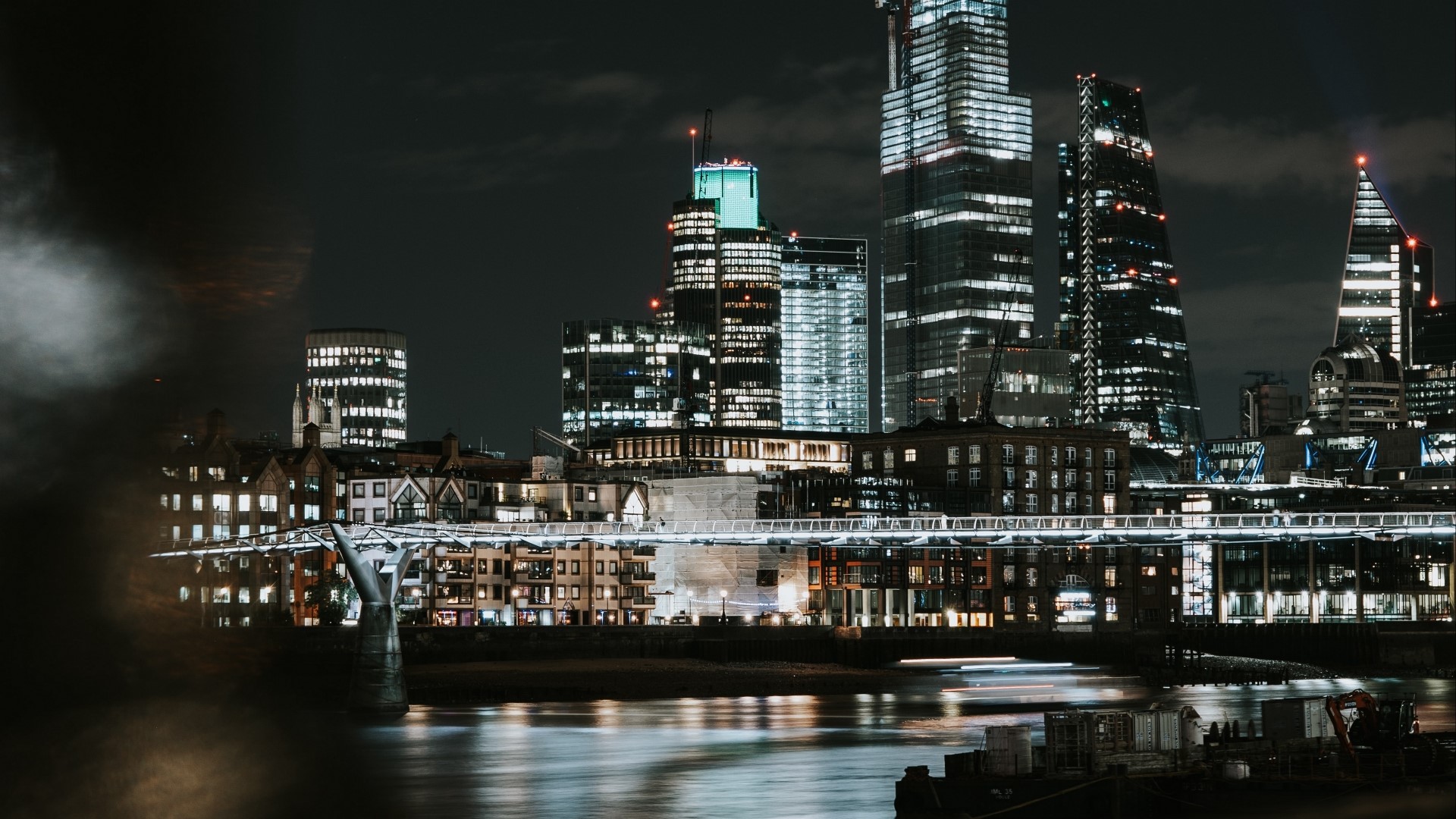 Night city skyline with river and bridge HD Wallpaper