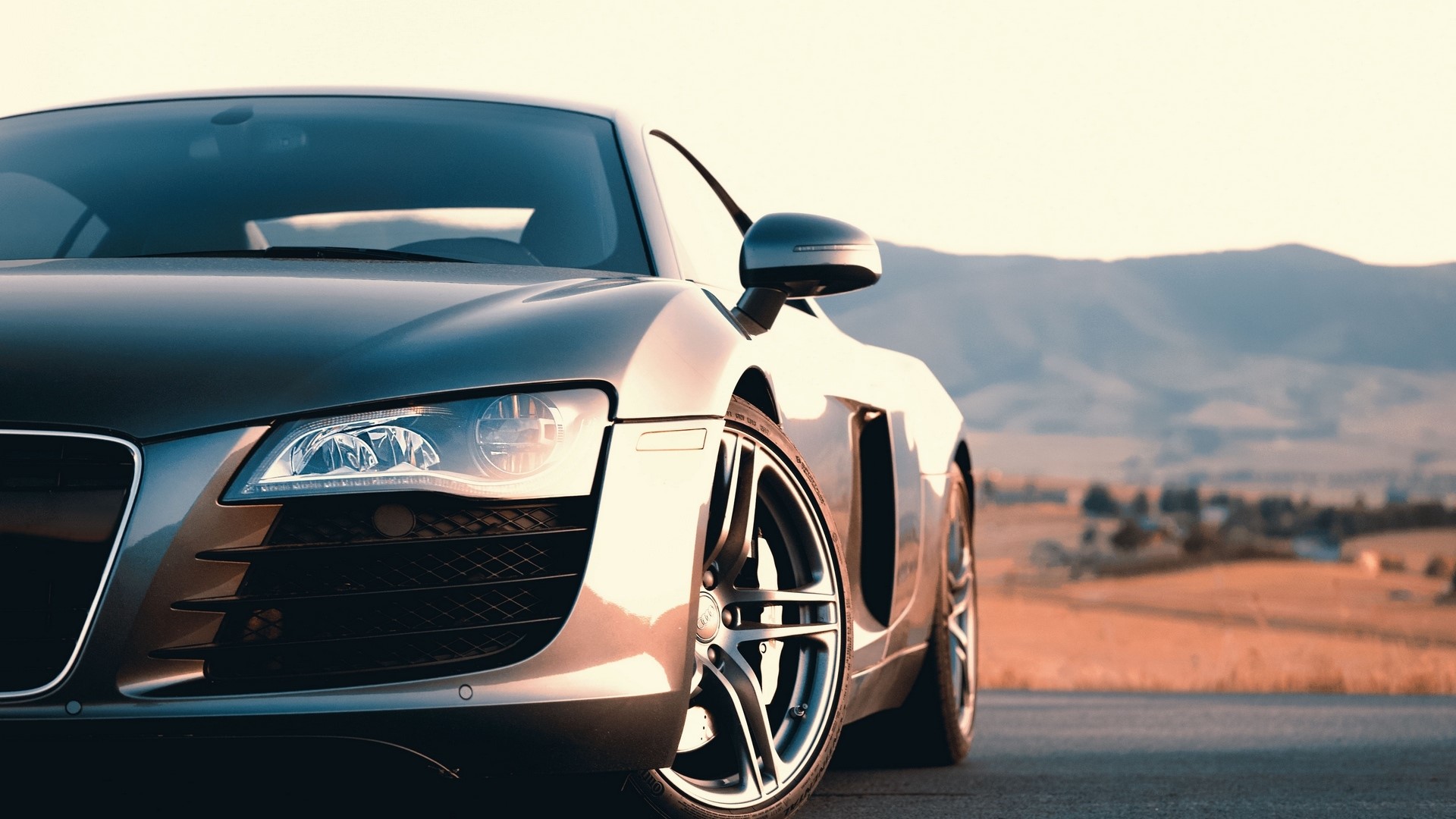 Audi R8 sports car on a road HD Wallpaper