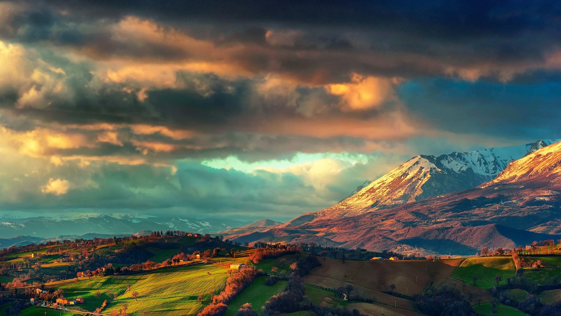 Italian mountains with dramatic clouds at sunset HD Wallpaper