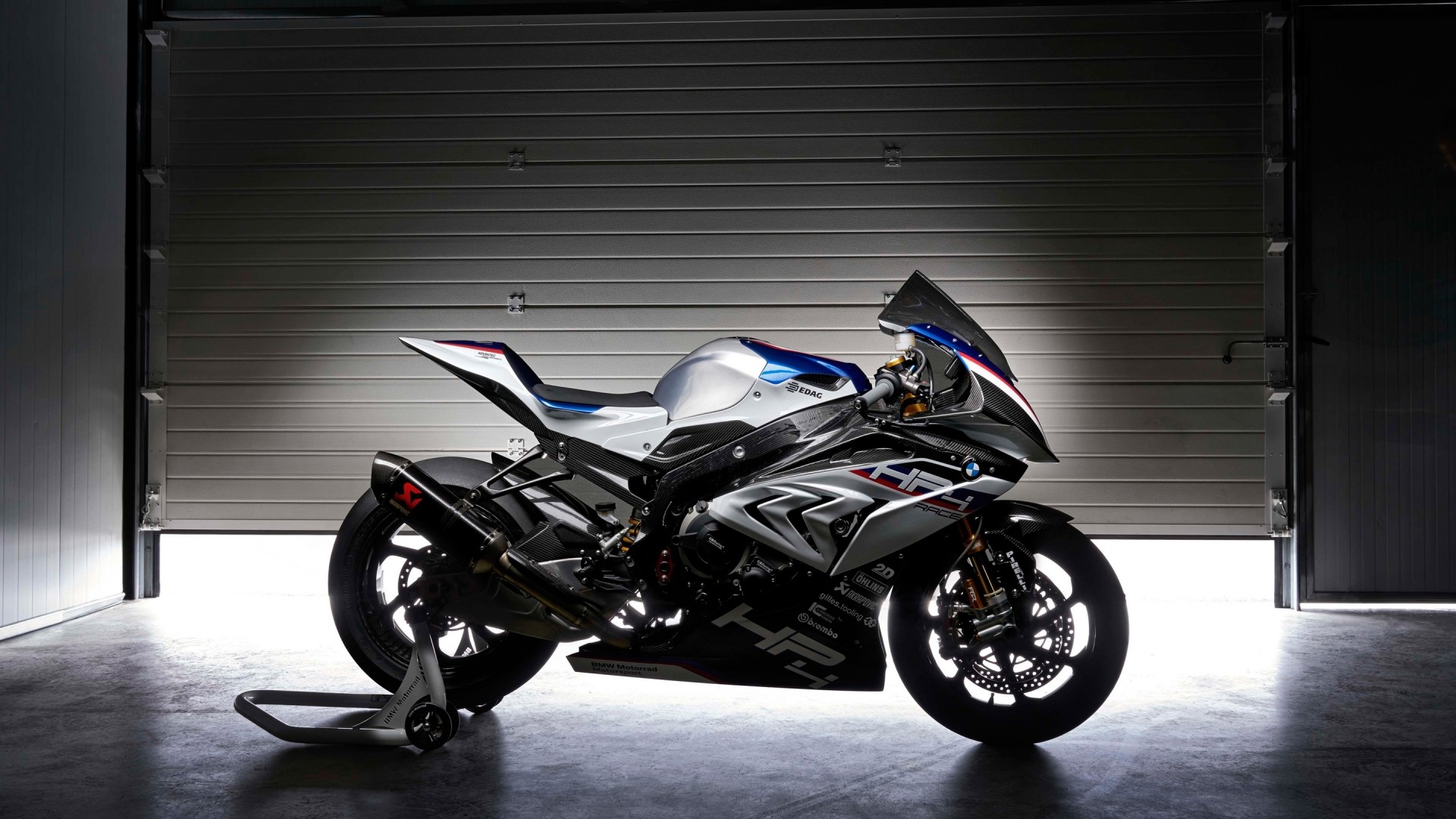 BMW HP4 motorcycle in a garage HD Wallpaper