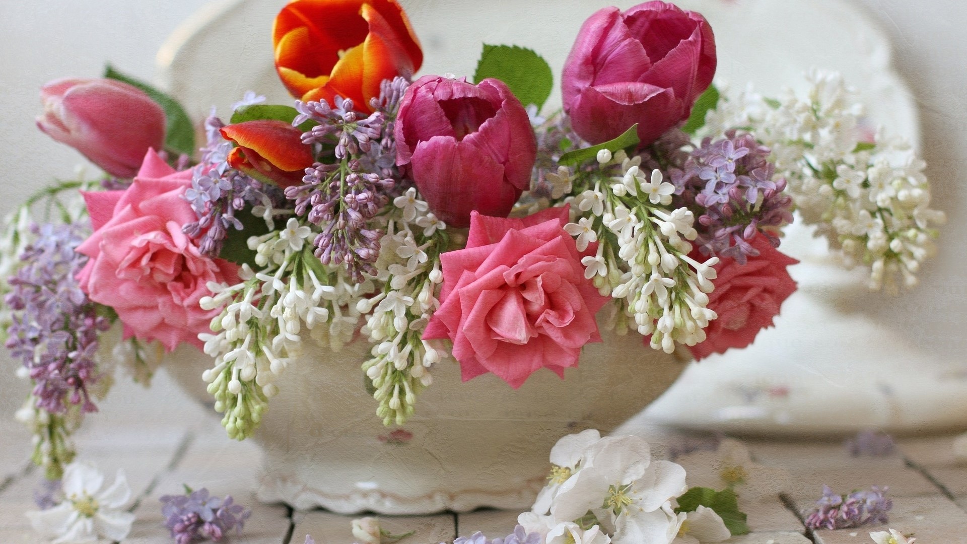 Spring bouquet of roses, tulips, and lilacs in a vase HD Wallpaper