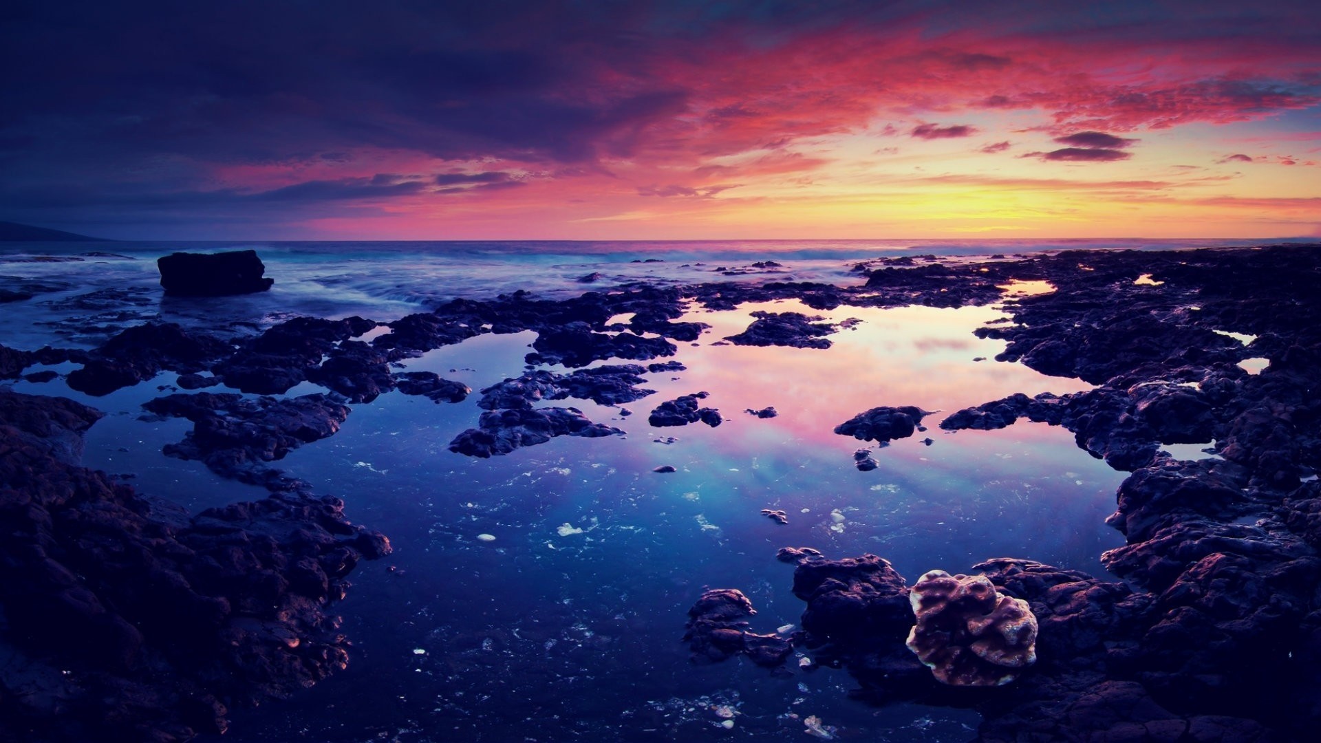 Sea sunset with rocky shore and tide pools HD Wallpaper