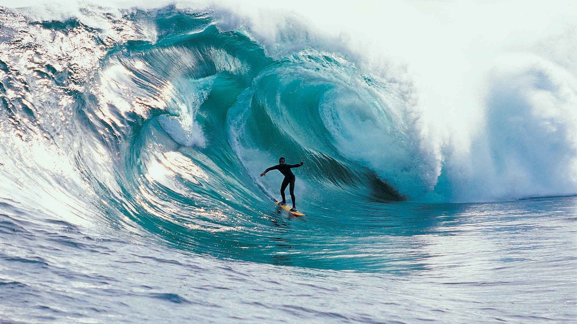 Surfer riding a massive wave HD Wallpaper
